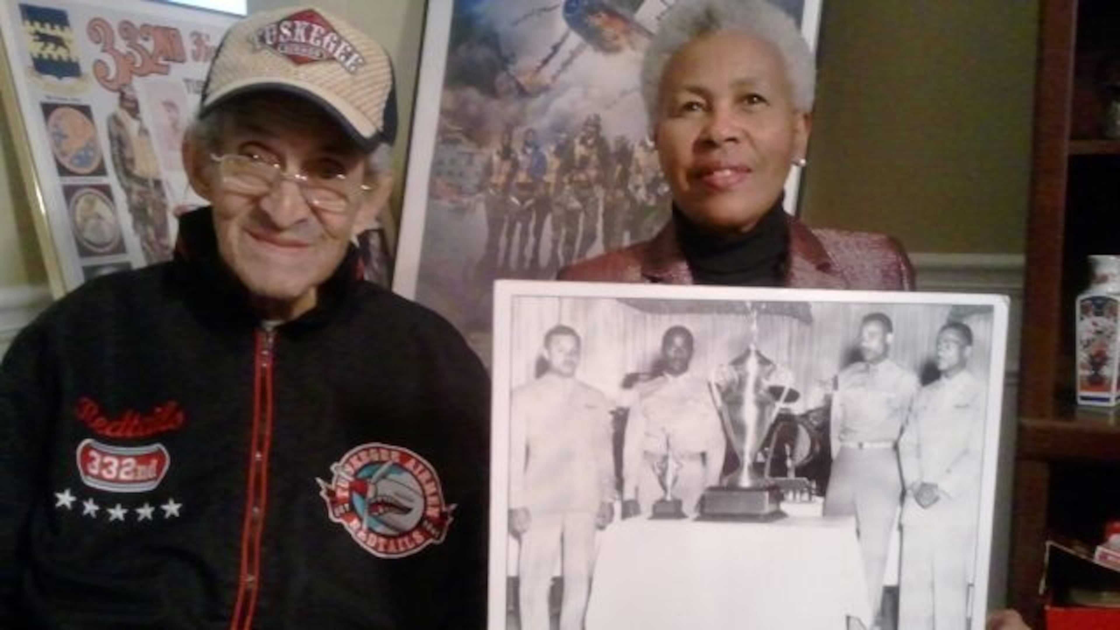 Zellie Orr with Tuskegee Airman Norris Connally and his artifacts. Photo credit: Geraldine Gilliam.
