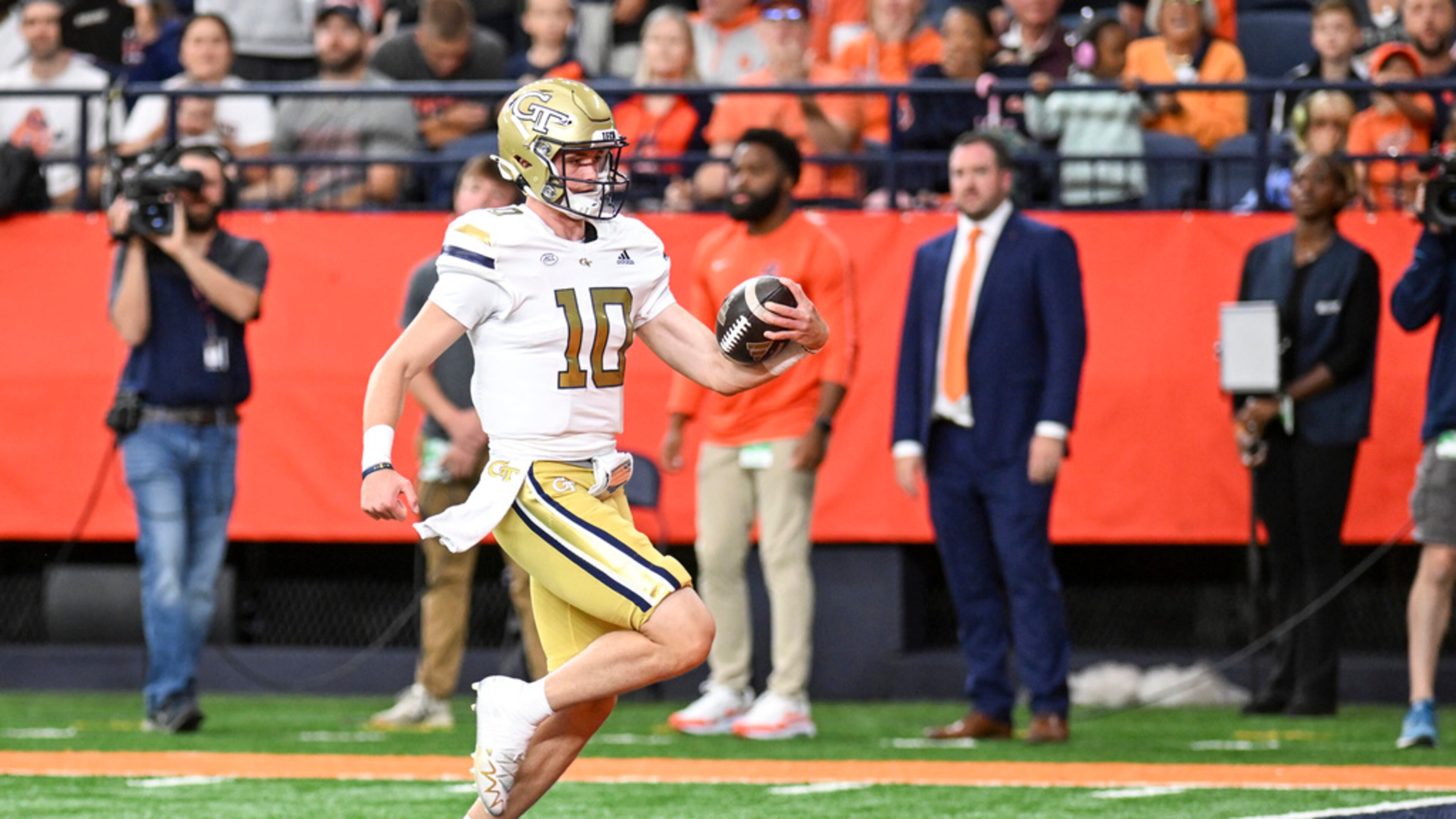 Georgia Tech quarterback Haynes King (10) runs for a touchdown against Syracuse during the first half of an NCAA football game on Saturday, Sept. 7, 2024, in Syracuse, N.Y. (Hans Pennink/AP)