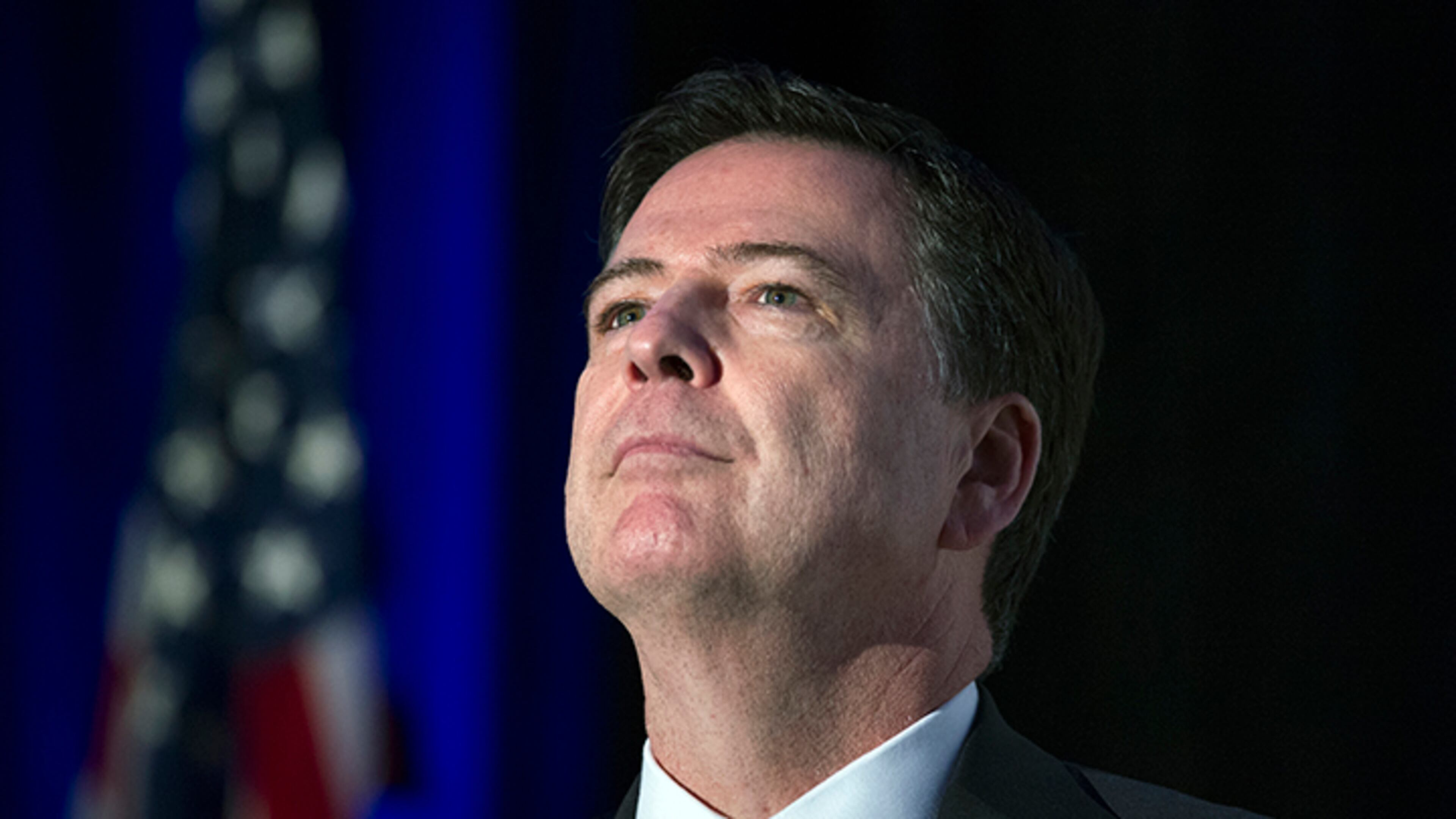 In this March 29, 2017 file photo, FBI Director James Comey addresses the Intelligence and National Security Alliance Leadership Dinner in Alexandria, Va. Comey cut an unorthodox path as head of the FBI, time and again compelled by strongly held convictions to speak with unusual candor and eloquence about the bureau's work. It's a combination of qualities that may come back to haunt the president who fired him.