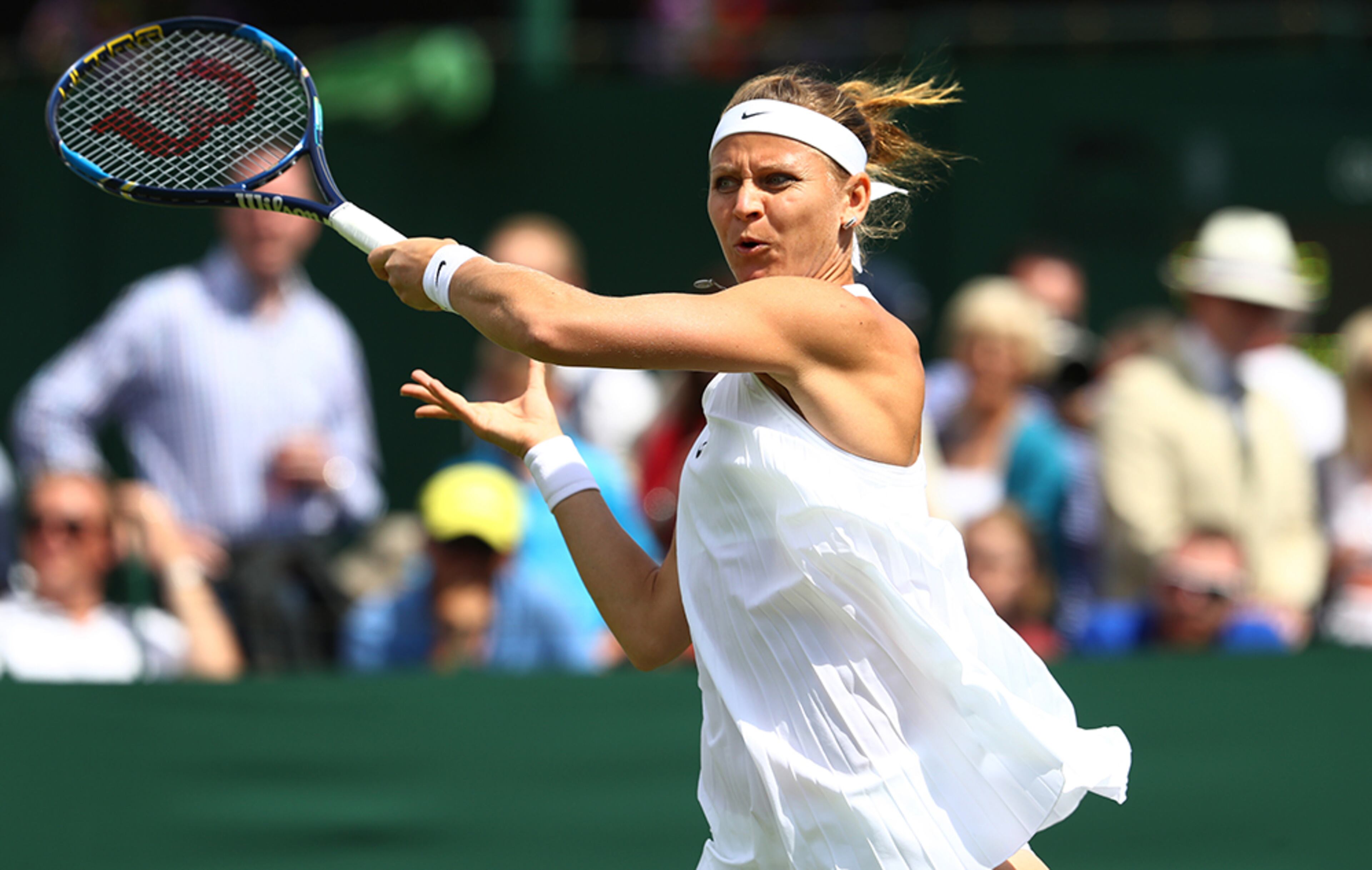 Czech Republic tennis star Lucie Safarova's dress didn't appear to be longer than the recalled version of the mini dress, but the open sides were sewn up.