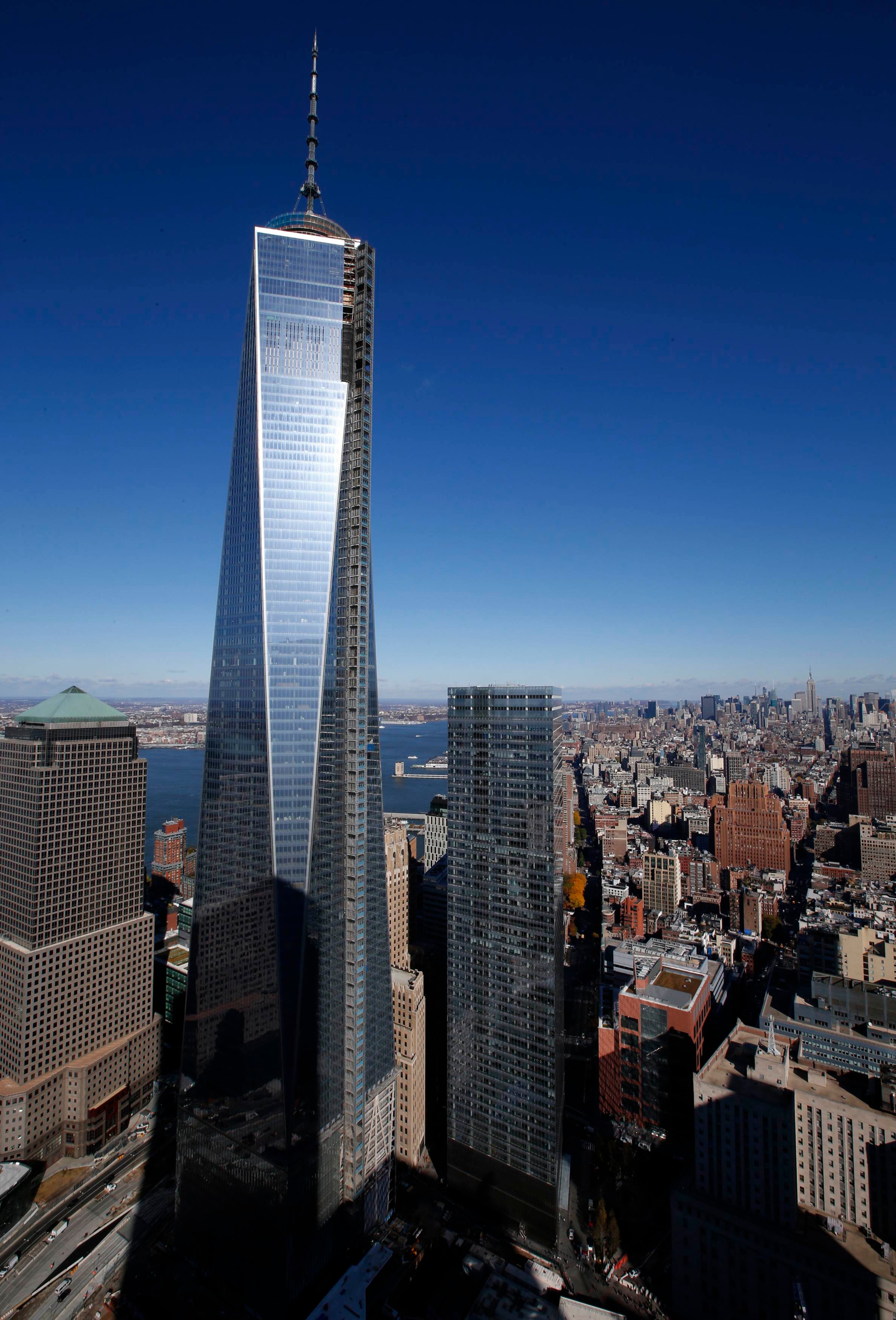 The One World Trade Center tower is seen in this picture taken from the 57th floor of the soon to be opened 4 World Trade Center tower in New York during a press tour, November 8, 2013. REUTERS/Mike Segar (UNITED STATES - Tags: BUSINESS CITYSCAPE)