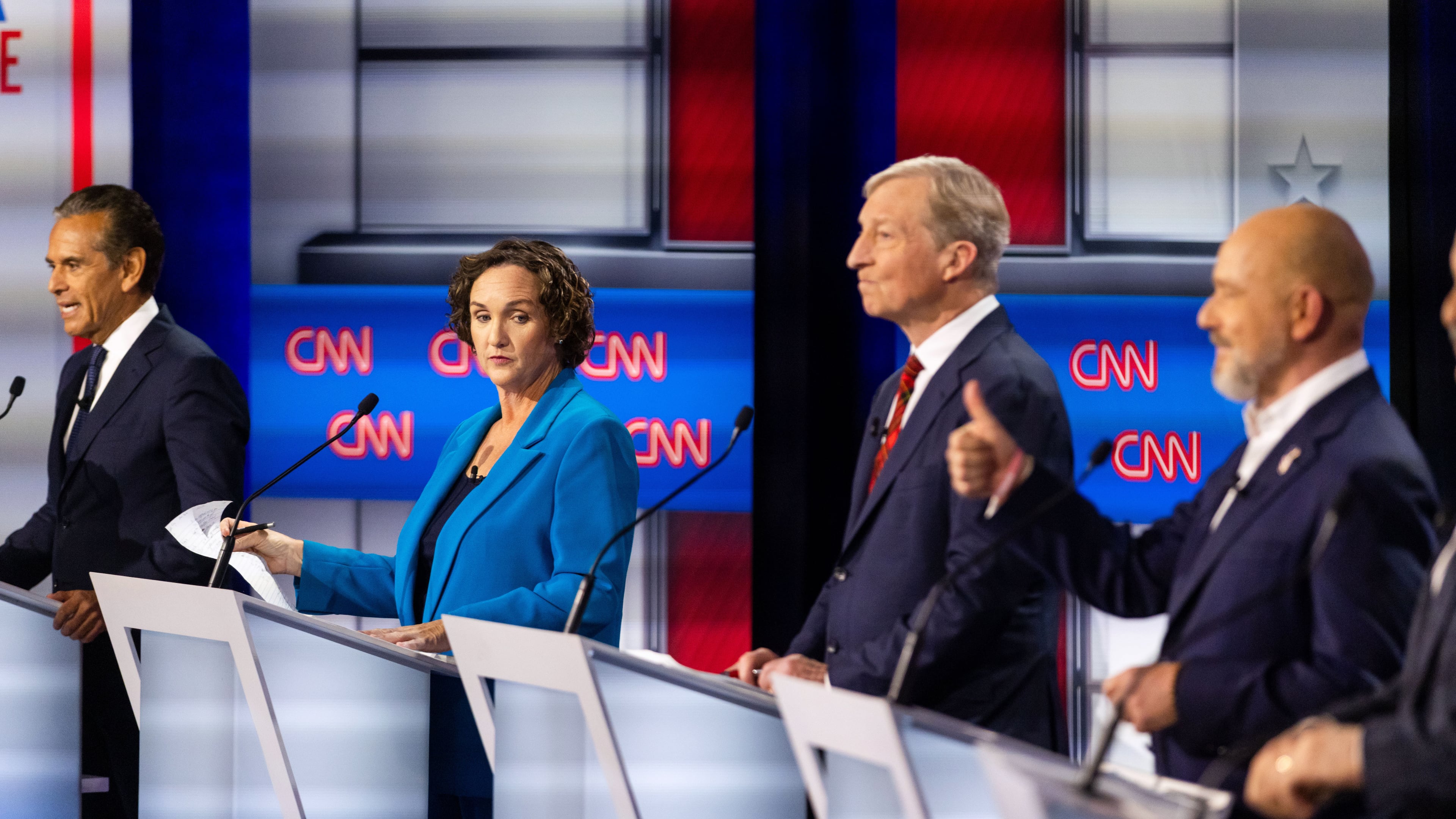 From left to right, Antonio Villaraigosa, Katie Porter, Tom Steyer and Steve Hilton participate in a California gubernatorial debate hosted by CNN at East Los Angeles College in Monterey Park, Calif. Tuesday, May 5, 2026. (AP Photo/Ethan Swope)