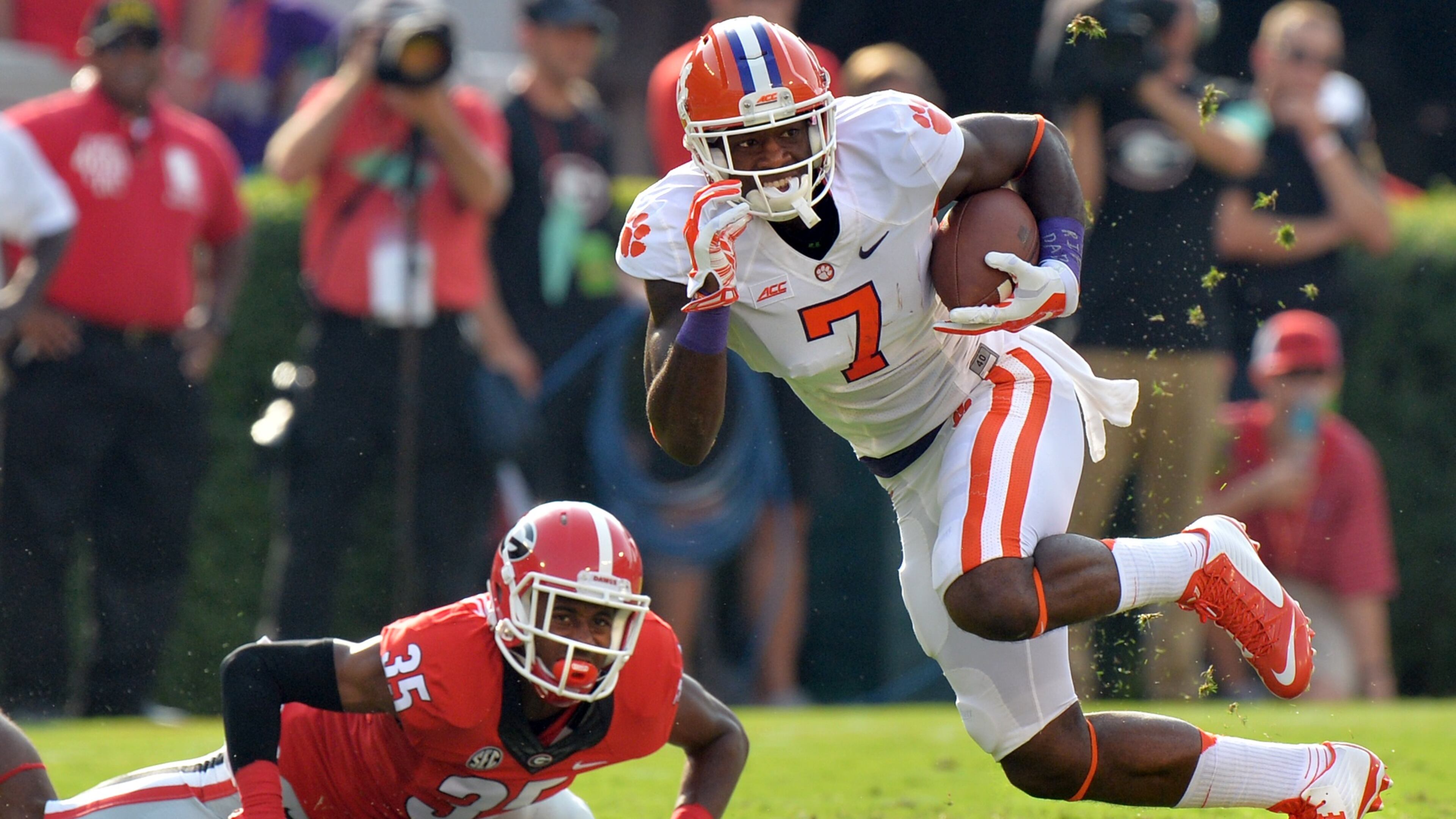 August 30, 2014 Athens, GA: Clemson Tigers wide receiver Mike Williams heads up field after catching a pass in front of Georgia Bulldogs cornerback Aaron Davis during the first half against Saturday August 30, 2014 in Athens. BRANT SANDERLIN / BSANDERLIN@AJC.COM