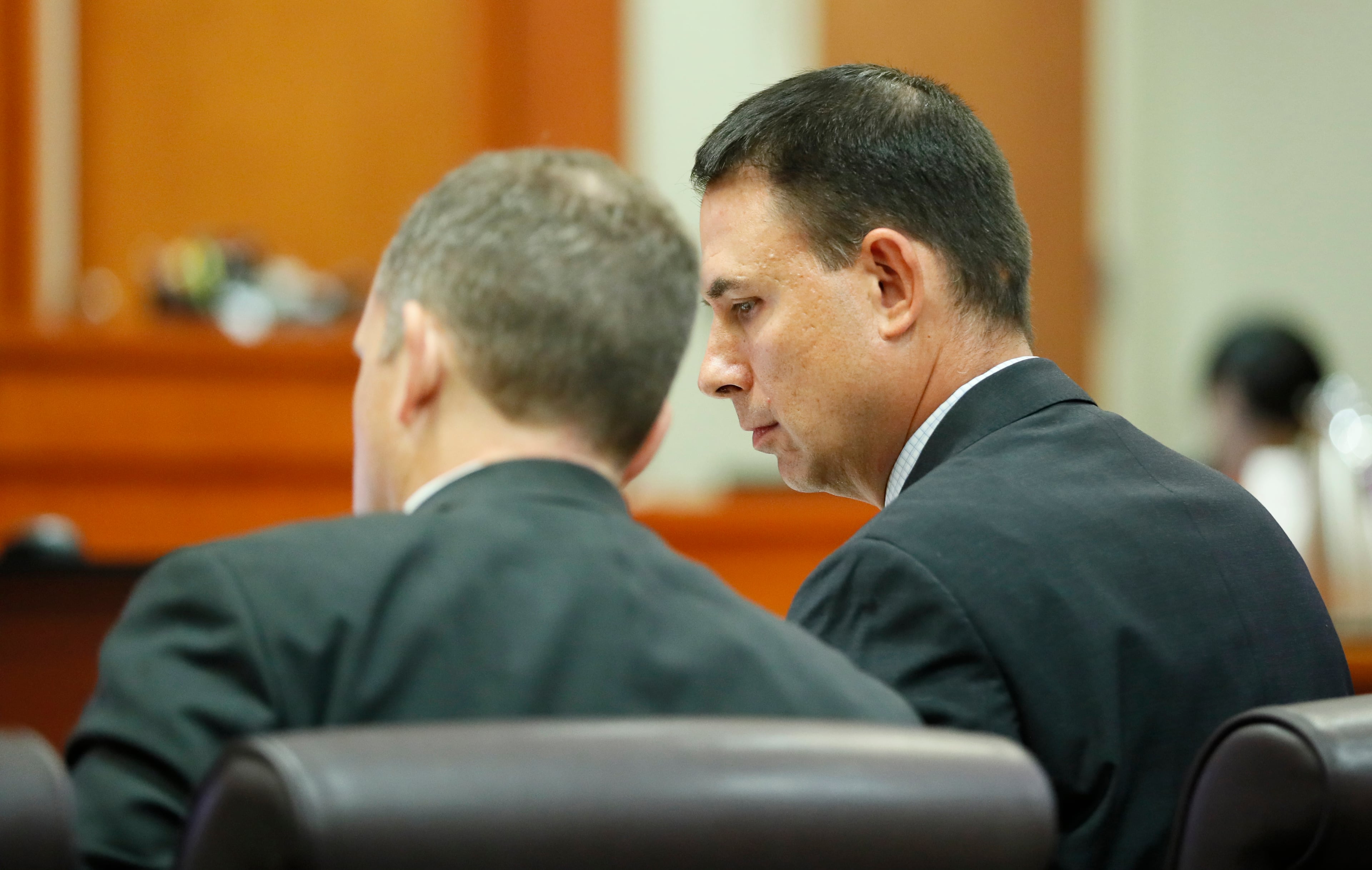 September 20, 2019 - Decatur - Prosecutor Pete Johnson (right) and Lance Cross confer during the hearing. Judge LaTisha Dear Jackson, the judge overseeing the murder trial against former DeKalb police officer Chip Olsen holds a pretrial hearing to consider the defense's request to keep out evidence that victim Anthony Hill was mentally ill and an Afghan war vet. Bob Andres / robert.andres@ajc.com
