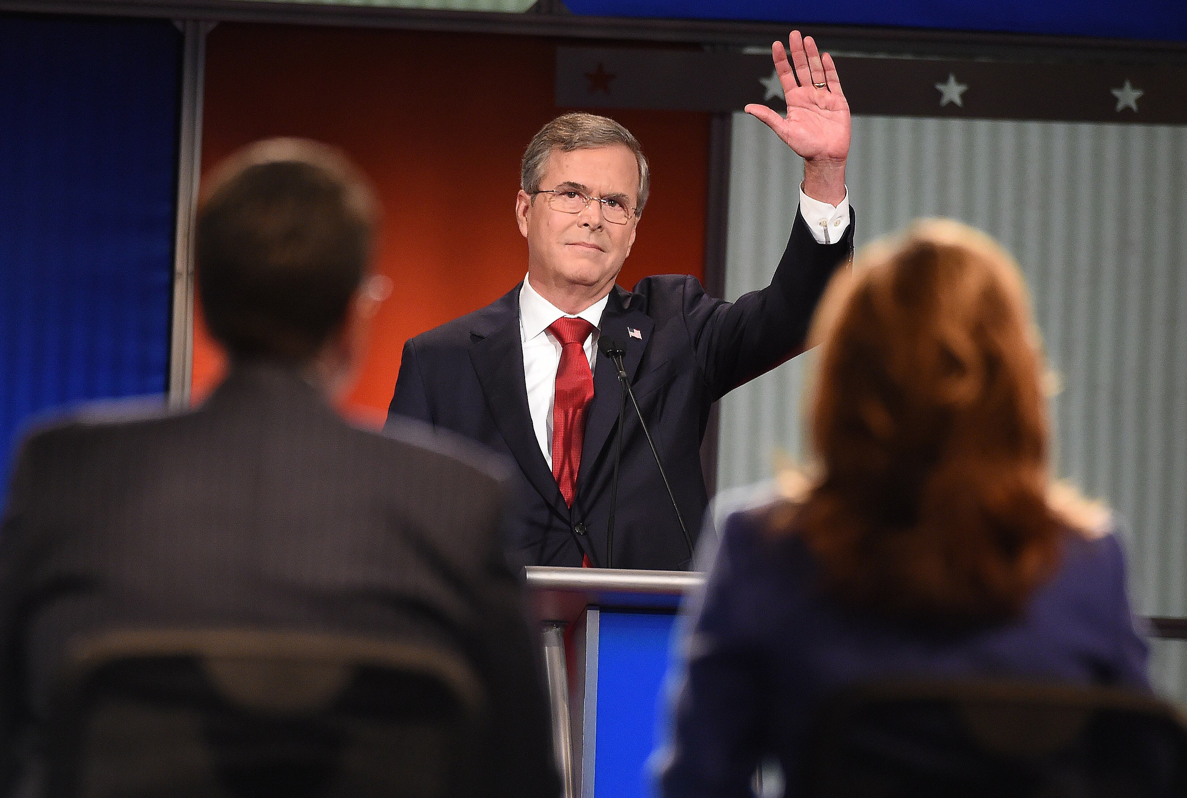 Republican presidential candidate, former Florida Gov. Jeb Bush waves to the audience during the Fox Business Network Republican presidential debate at the North Charleston Coliseum, Thursday, Jan. 14, 2016, in North Charleston, S.C. (AP Photo/Rainier Ehrhardt)