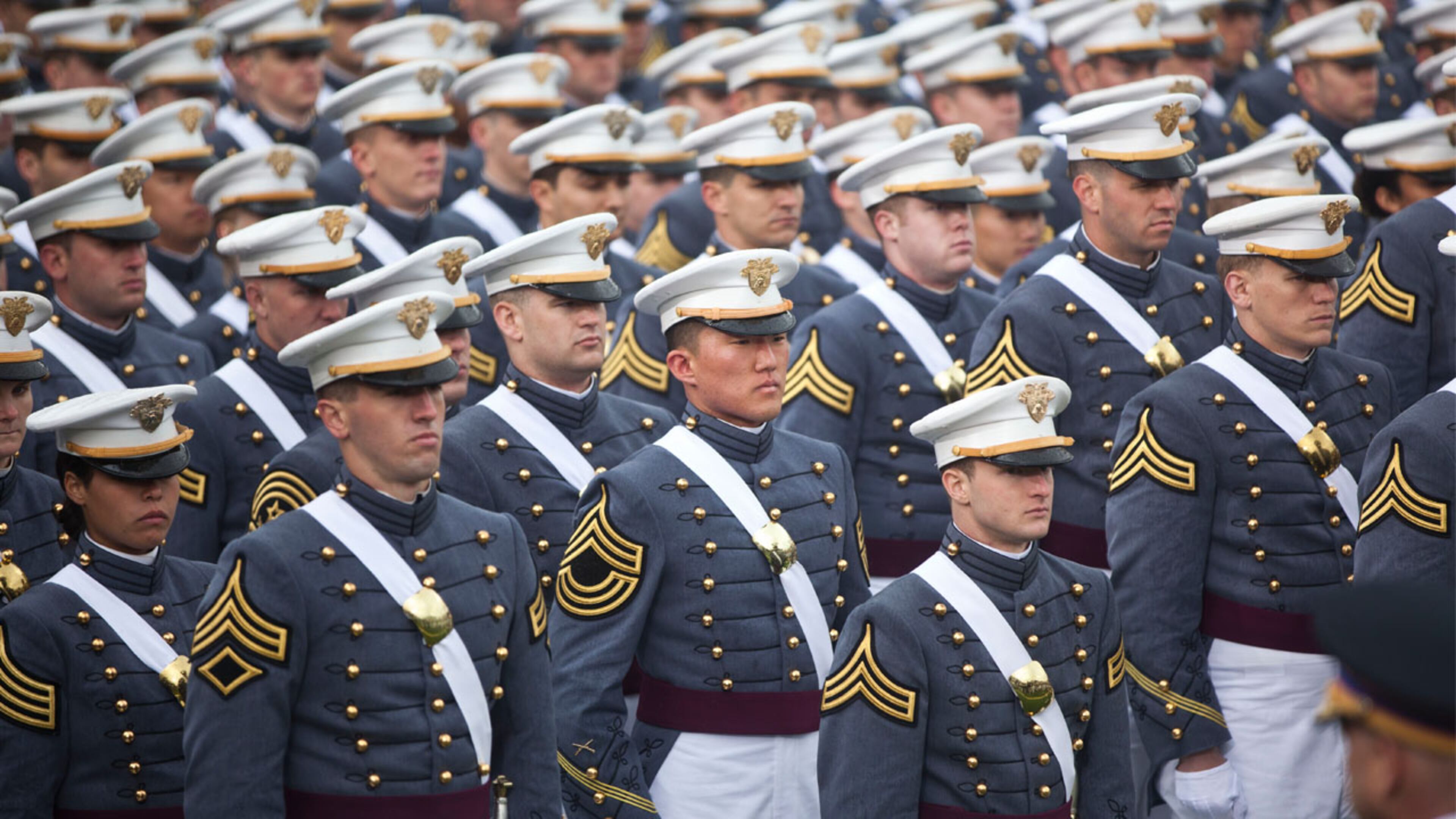 2013 graduating cadets stand in formation at the United States Military Academy at West Point (USMA) during the 215 commencement ceremony May 25, 2013 in West Point, New York.