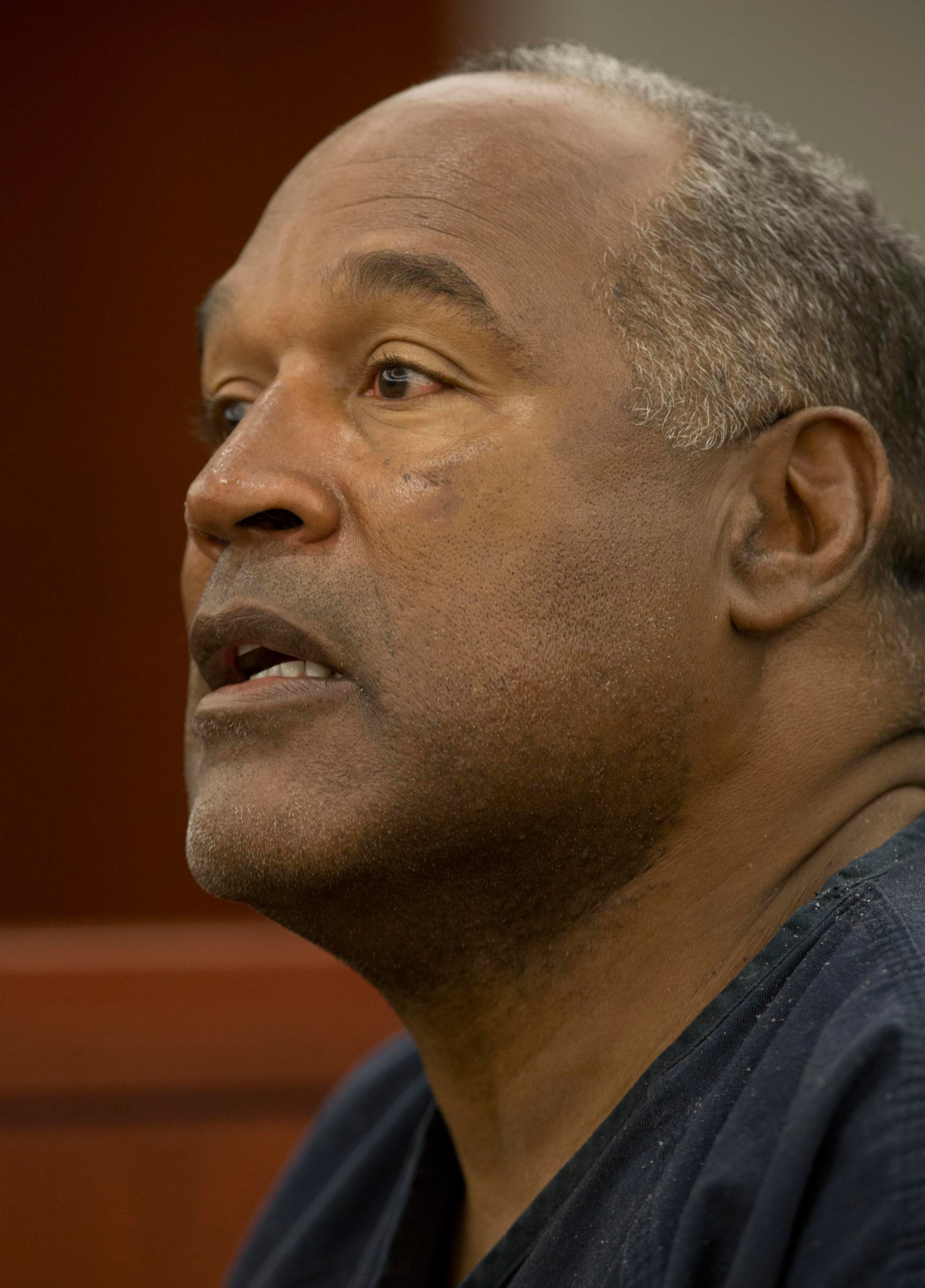 O.J. Simpson testifies during an evidentiary hearing in Clark County District Court, Wednesday, May 15, 2013 in Las Vegas. Simpson, who is currently serving a nine to 33-year sentence in state prison as a result of his October 2008 conviction for armed robbery and kidnapping charges, is using a writ of habeas corpus, to seek a new trial, claiming he had such bad representation that his conviction should be reversed. (AP Photo/Julie Jacobson, Pool)