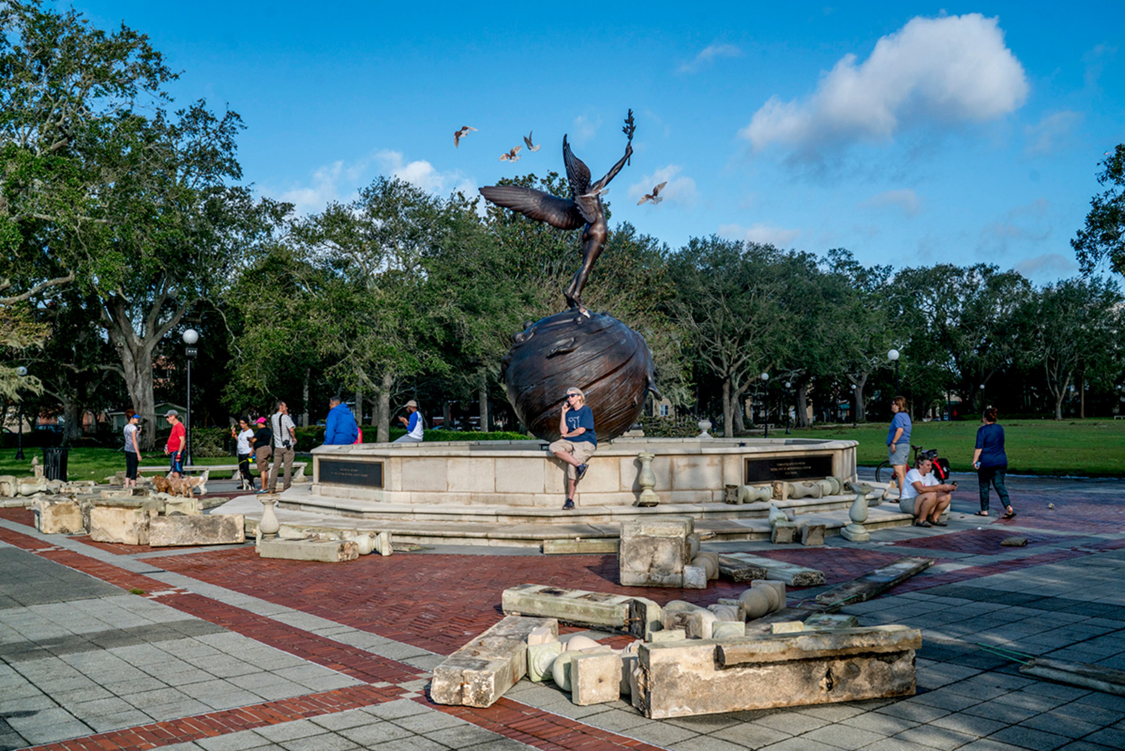 Jacksonville, Fla.: People inspect damages at Memorial Park after floodwaters receded a day after Hurricane Irma, along the St. Johns River in the Riverside neighborhood of Jacksonville, Fla., Sept. 12, 2017. Downgraded to a tropical depression, Irma left Florida in shambles as it moved into Georgia, Alabama and the Carolinas. (Johnny Milano/The New York Times)