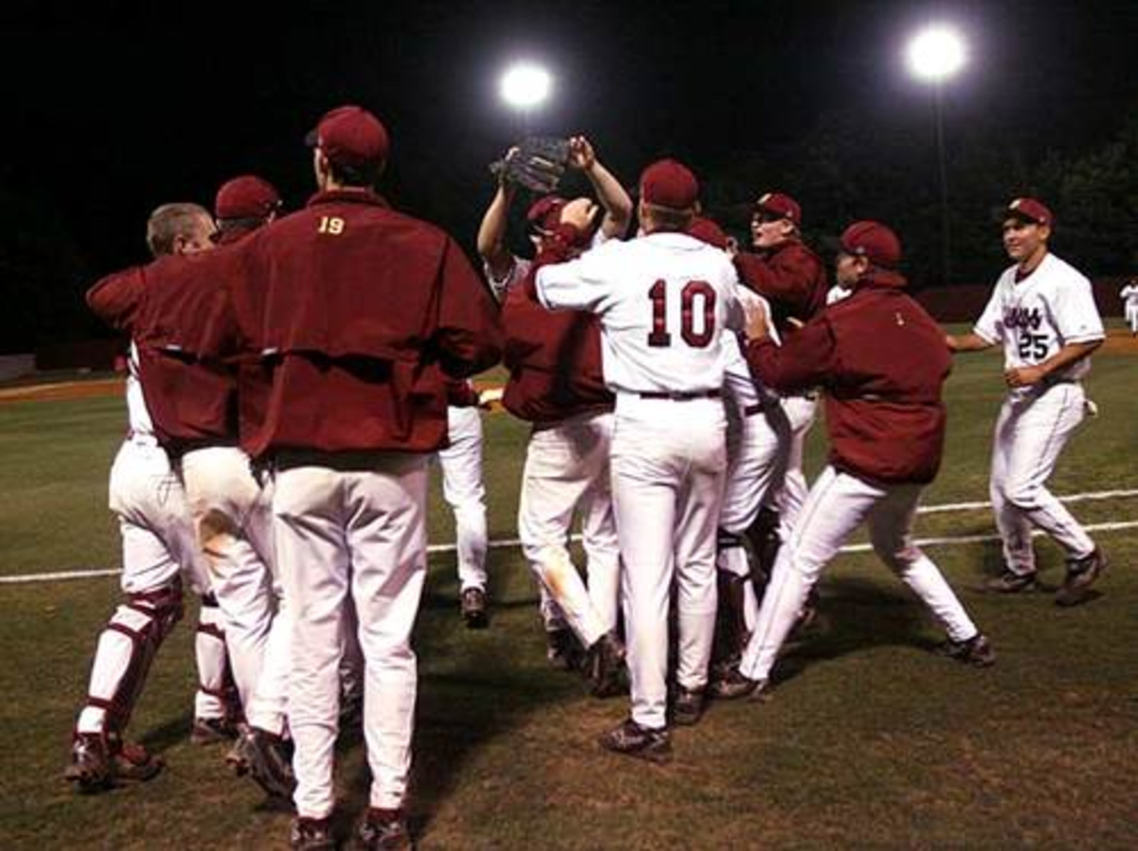 Brookwood players celebrate their 7-2 win over Norcross in game three of their second-round series. Brookwood plays East Coweta in quarterfinals May 20.