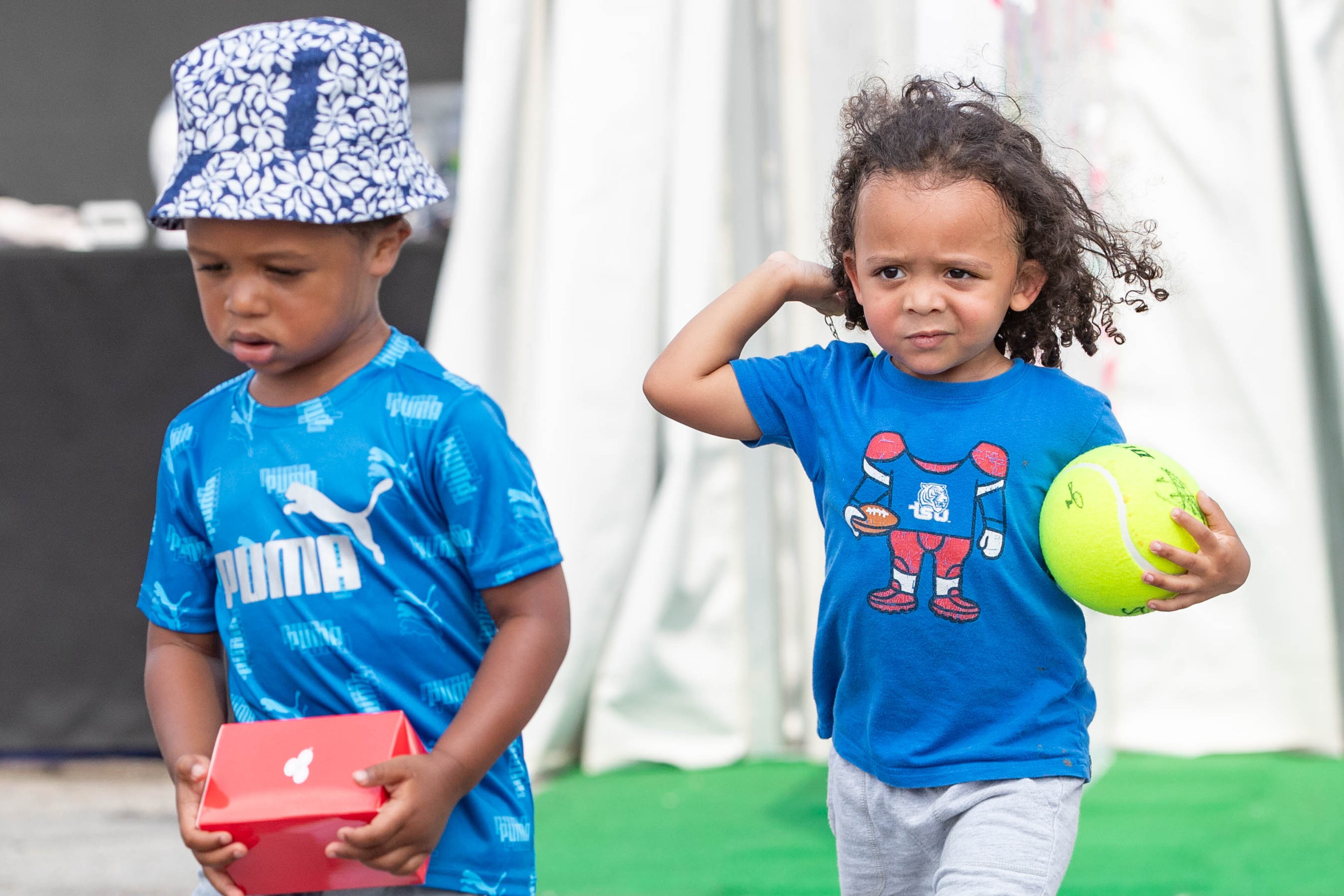 Elijah Kante and Max Hale spend their day at the Atlanta Open. (Katelyn Myrick/katelyn.myrick@ajc.com)