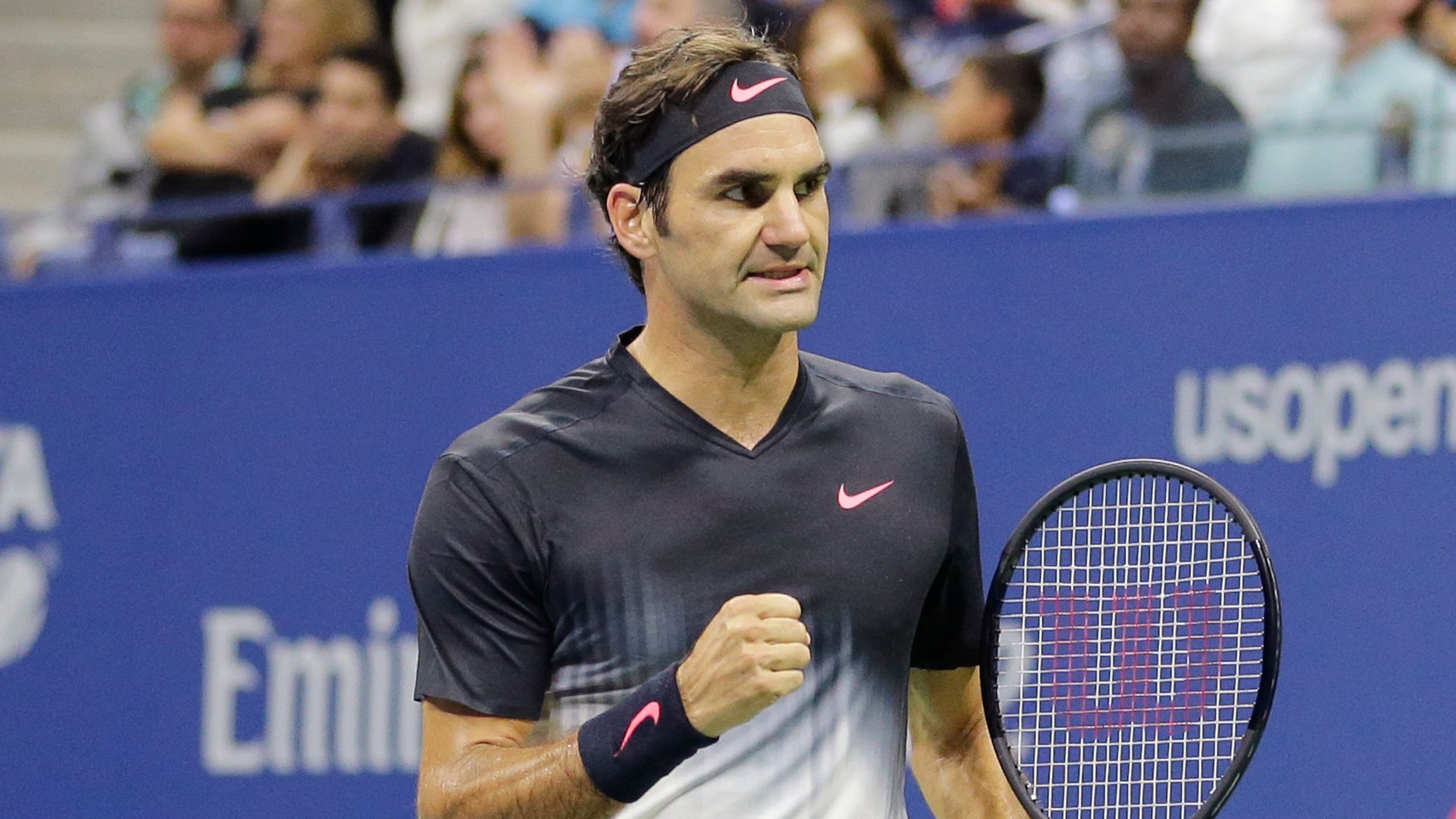 FILE - Roger Federer, of Switzerland, clenches his fist after wining a point against Feliciano Lopez, of Spain, during the U.S. Open tennis tournament in New York, Sept. 2, 2017. (AP Photo/Seth Wenig)