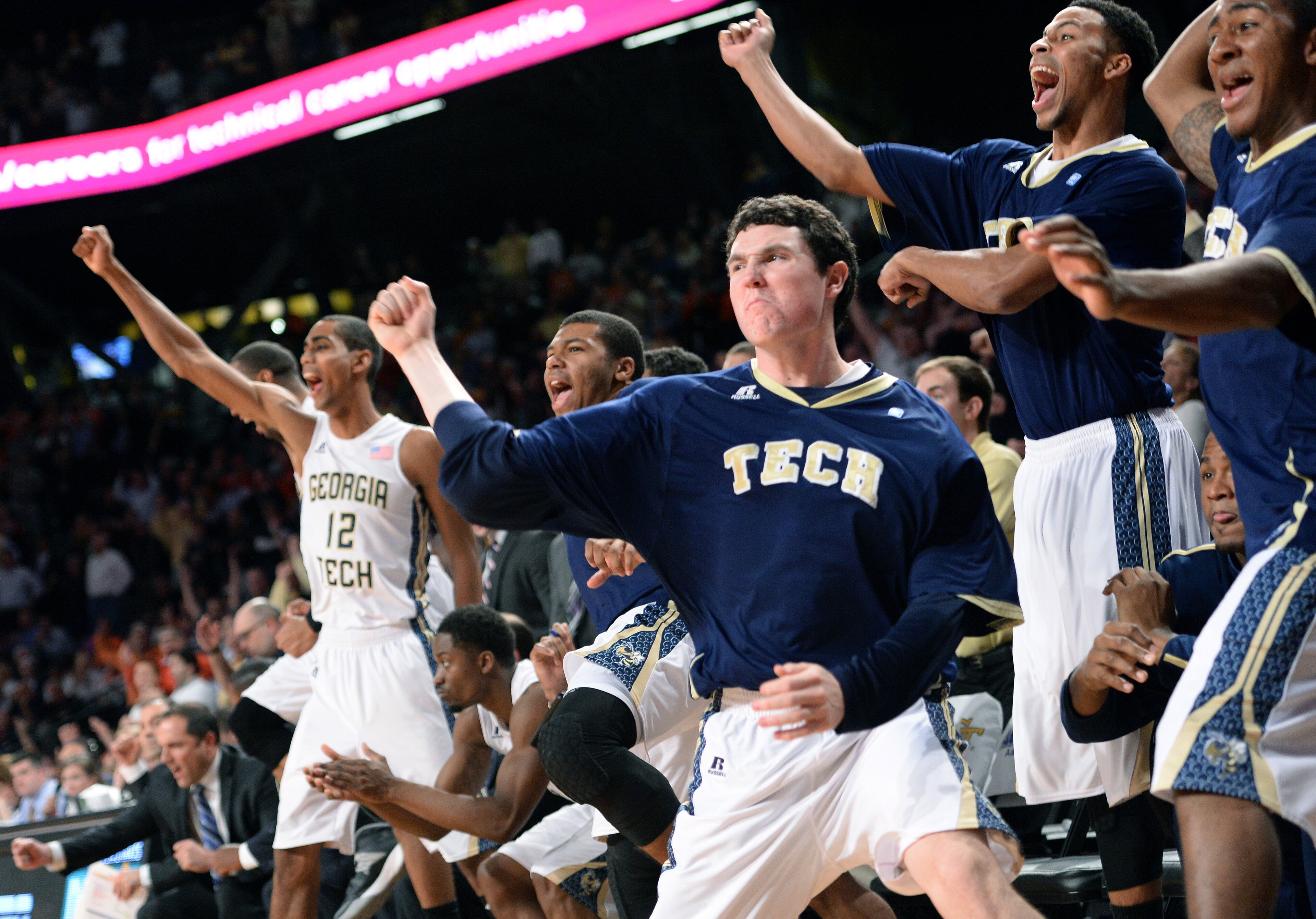 Georgia Tech Yellow Jackets players celebrate at the end of the second half during the Big Ten/ACC Challenge game at McCamish Pavilion on Tuesday, December 3, 2013. Georgia Tech Yellow Jackets won 67 - 64 over the Illinois Fighting Illini.