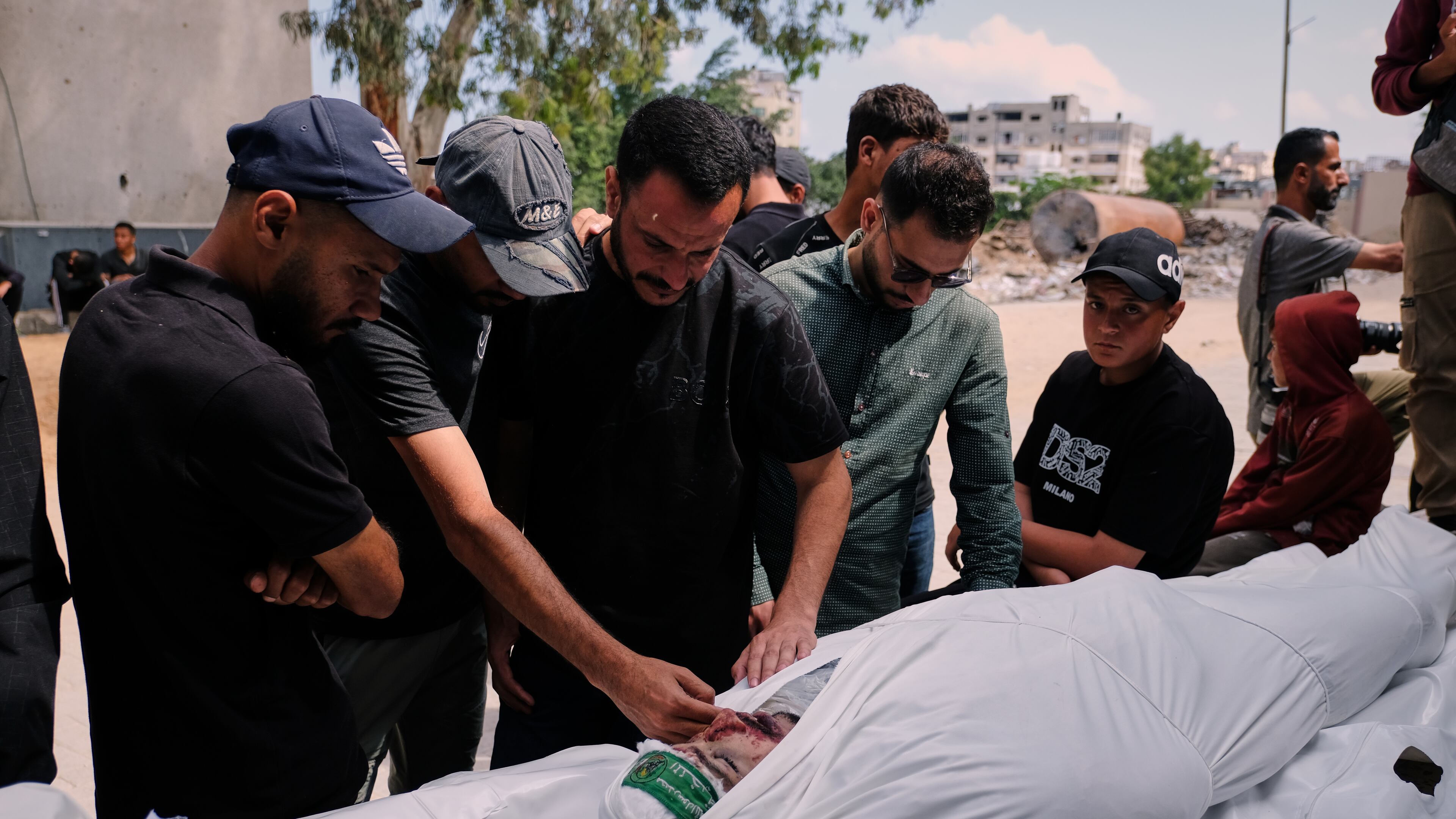 Palestinians mourn over the body of Mohammad Odeh, whom Israel says was a leader of Hamas Qassam Brigades, a day after he was killed in an Israeli airstrike, during his funeral in Gaza City, Wednesday, May 27, 2026. (AP Photo/Jehad Alshrafi)
