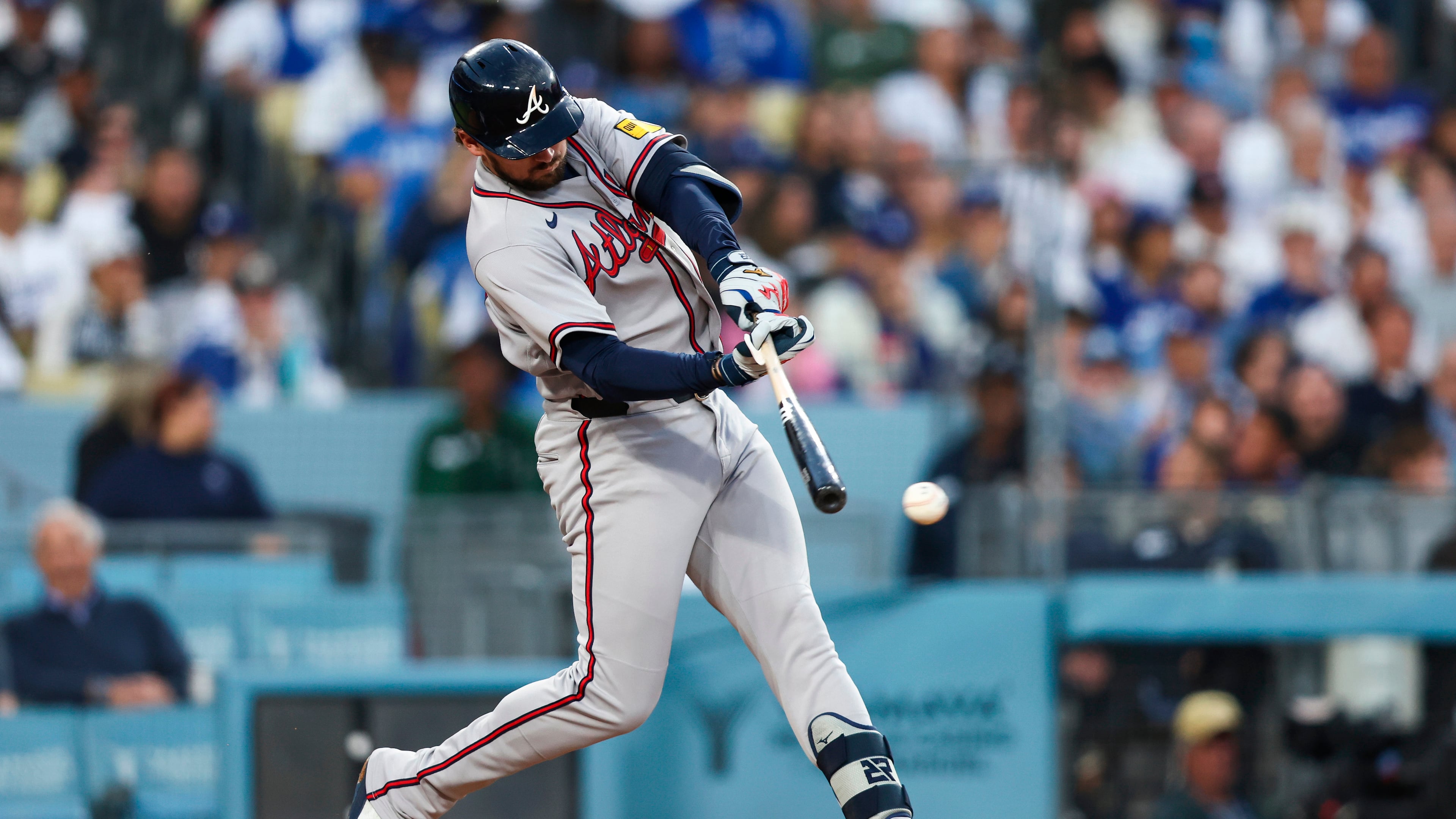 Atlanta Braves' Austin Riley hits an RBI single during the second inning of a baseball game against the Los Angeles Dodgers, Friday, May 8, 2026, in Los Angeles. (AP Photo/Jessie Alcheh)