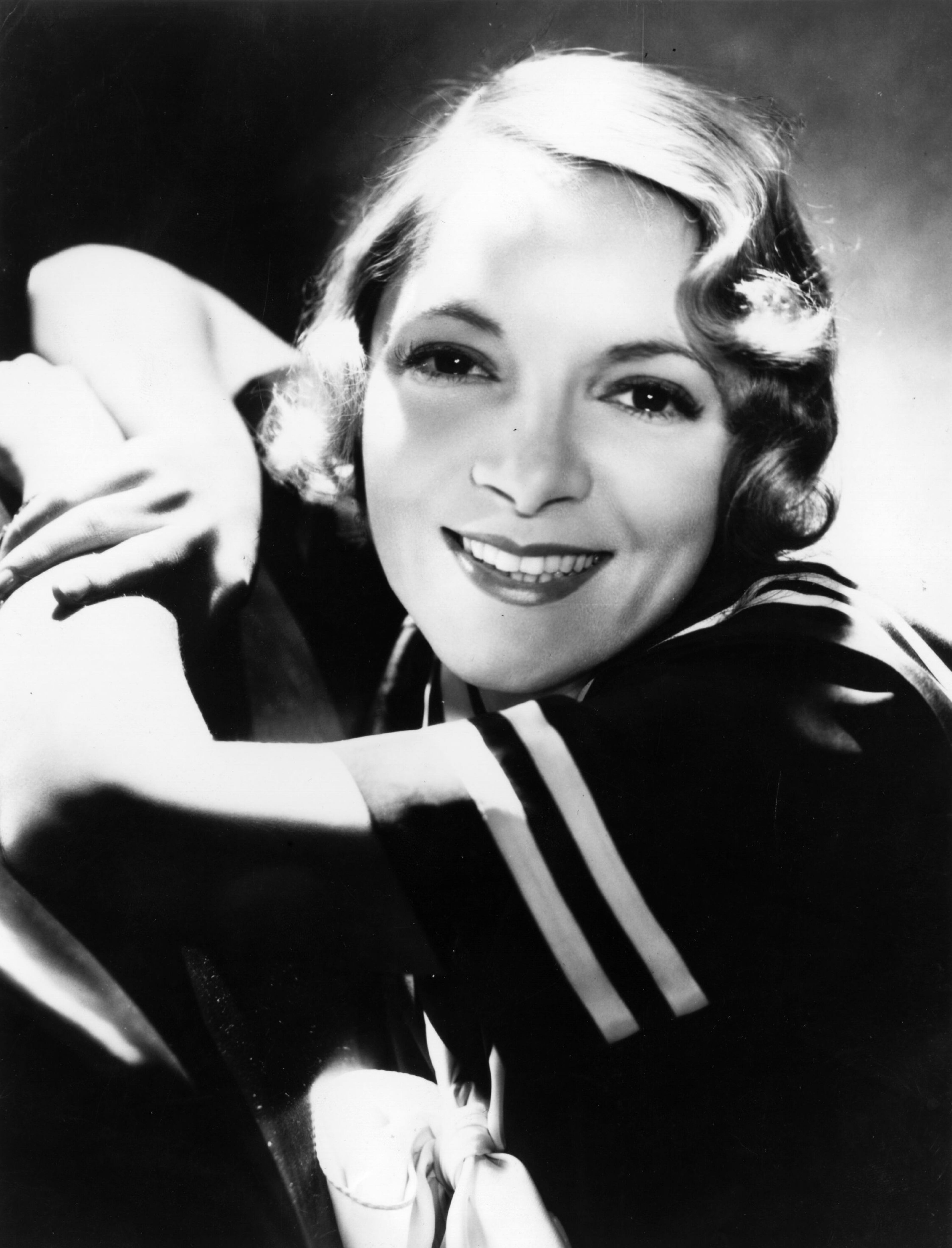 Helen Hayes was the first woman to win all four awards. Emmy: 1953 for Best Actress for a Schlitz Playhouse of Stars for the episode "Not a Chance"; Grammy: 1976 for Best Spoken Word Recording for "Great American Documents"; Oscar: Two, including 1970 for Best Actress in a Supporting Role for "Airport"; Tony: Two, including 1958 for Best Actress, Dramatic for "Time Remembered." Hayes also has a Special Tony Award.