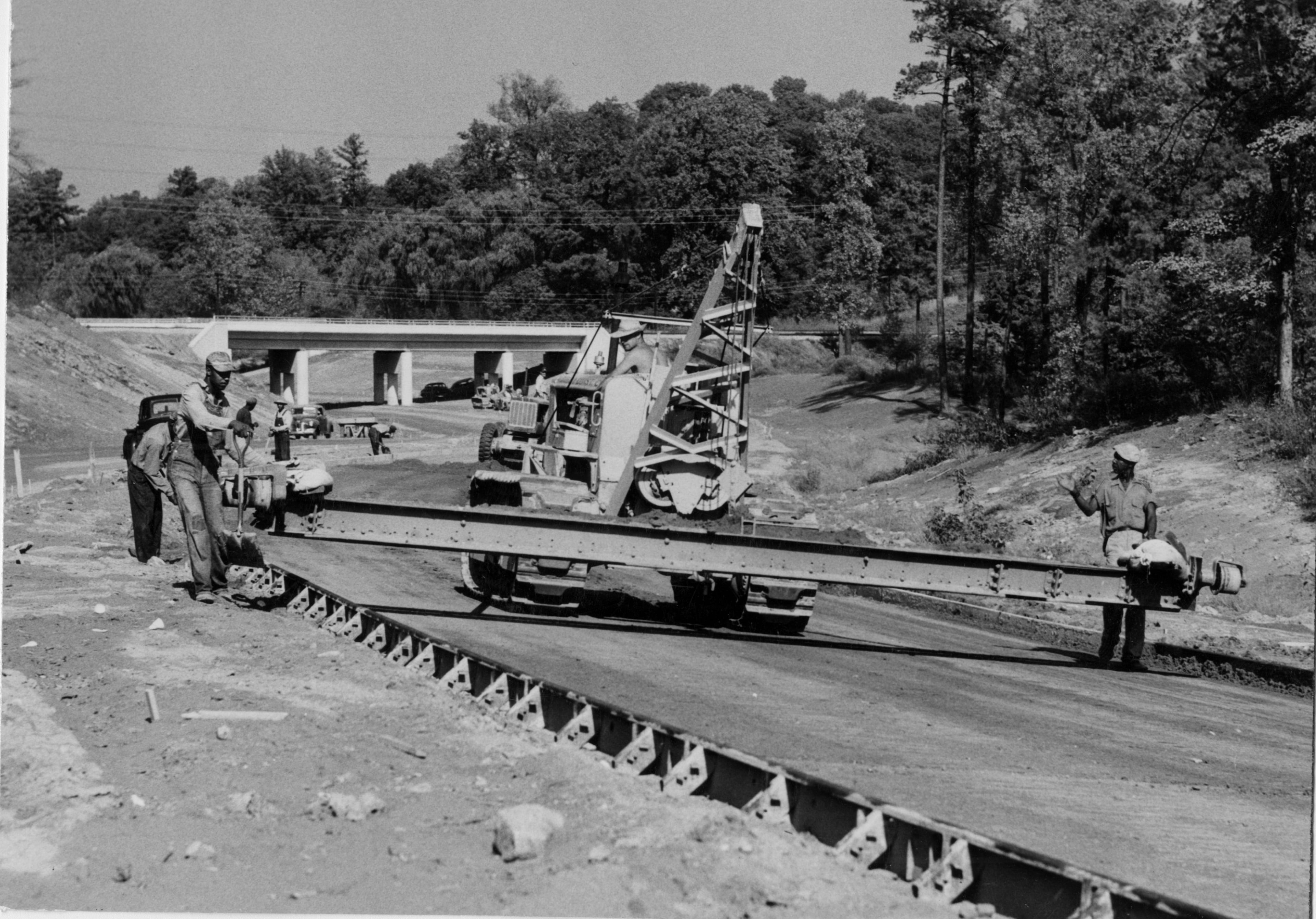 Oct. 1953 - Atlanta, GA -- Northeast leg of expressway, Brookwood to Piedmont. Stretch nearly two miles long is now being paved. (Dallas Buck/AJC staff)
