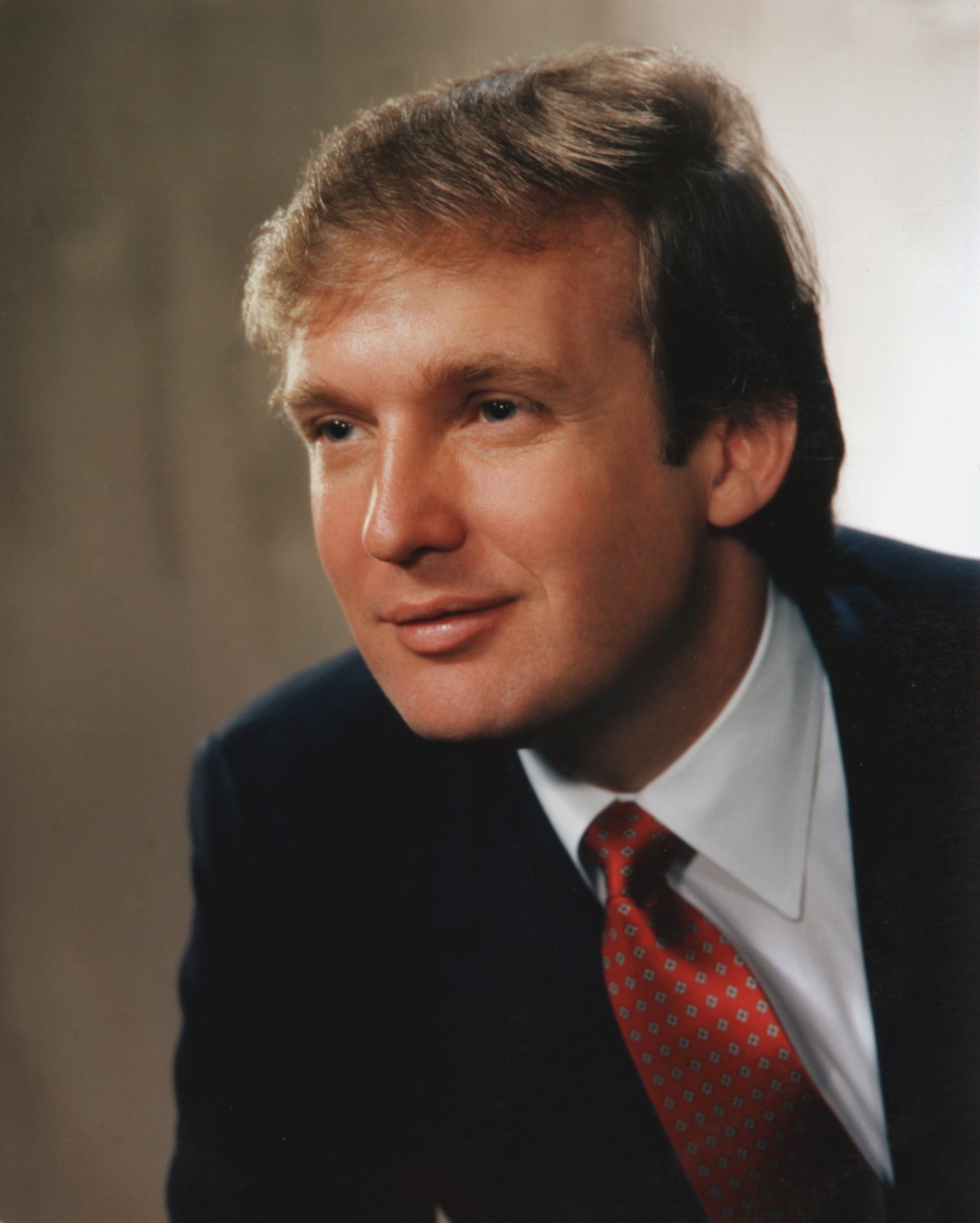 Portrait of real estate mogul Donald John Trump (b.1946), smiling slightly and facing to his right, 1983. New York. (Photo by Bachrach/Getty Images)
