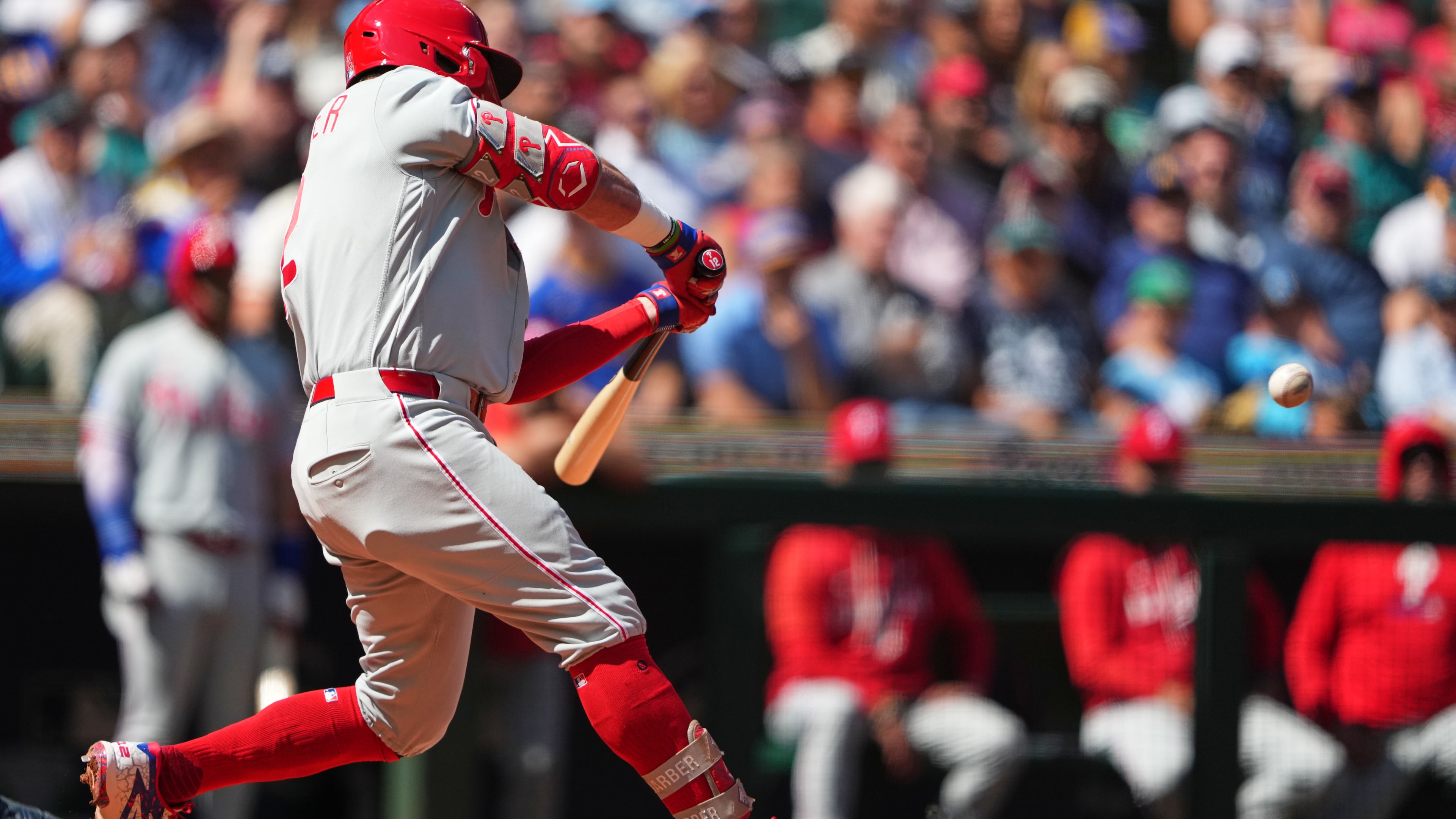 Philadelphia Phillies' Kyle Schwarber hits a three-run home run against Seattle Mariners starting pitcher Bryan Woo during the second inning of a baseball game, Wednesday, Aug. 26, 2026, in Seattle. (AP Photo/Lindsey Wasson)