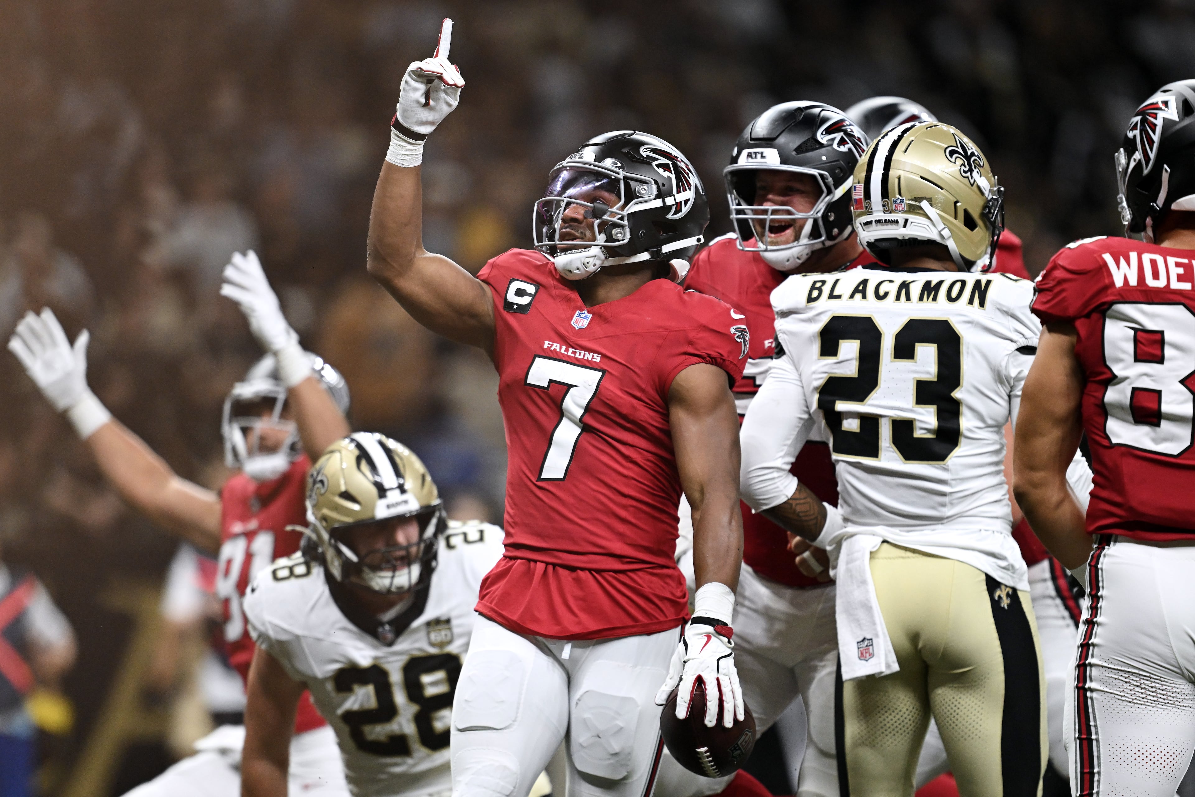 Atlanta Falcons running back Bijan Robinson (center) celebrates after scoring against the New Orleans Saints during the first half of an NFL football game in New Orleans, Monday, Oct. 5, 2026. (Ella Hall/AP)