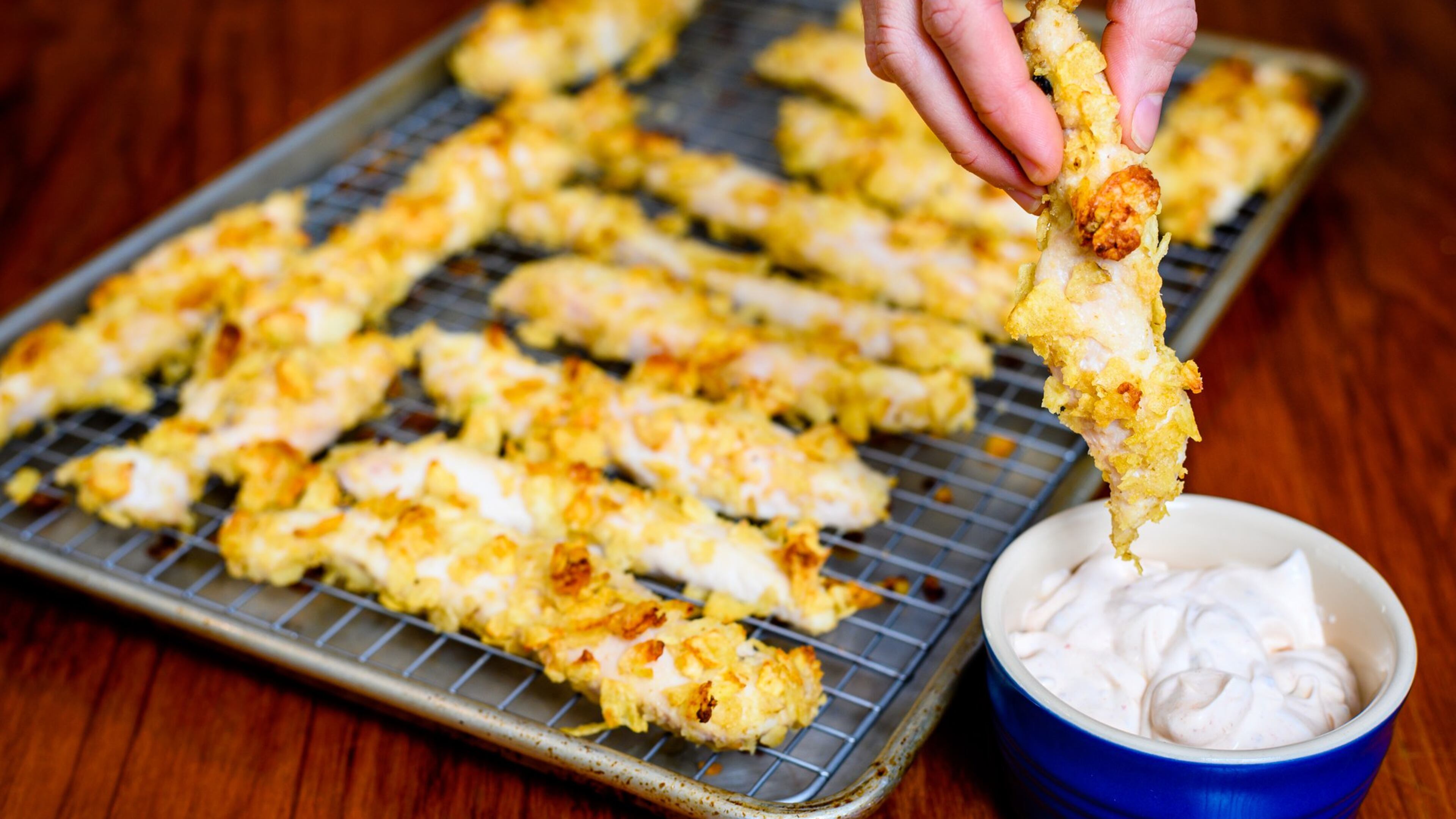 You use sour cream to help bread your Potato Chip Chicken Tenders, as well as for the base of the accompanying sauce. CONTRIBUTED BY HENRI HOLLIS