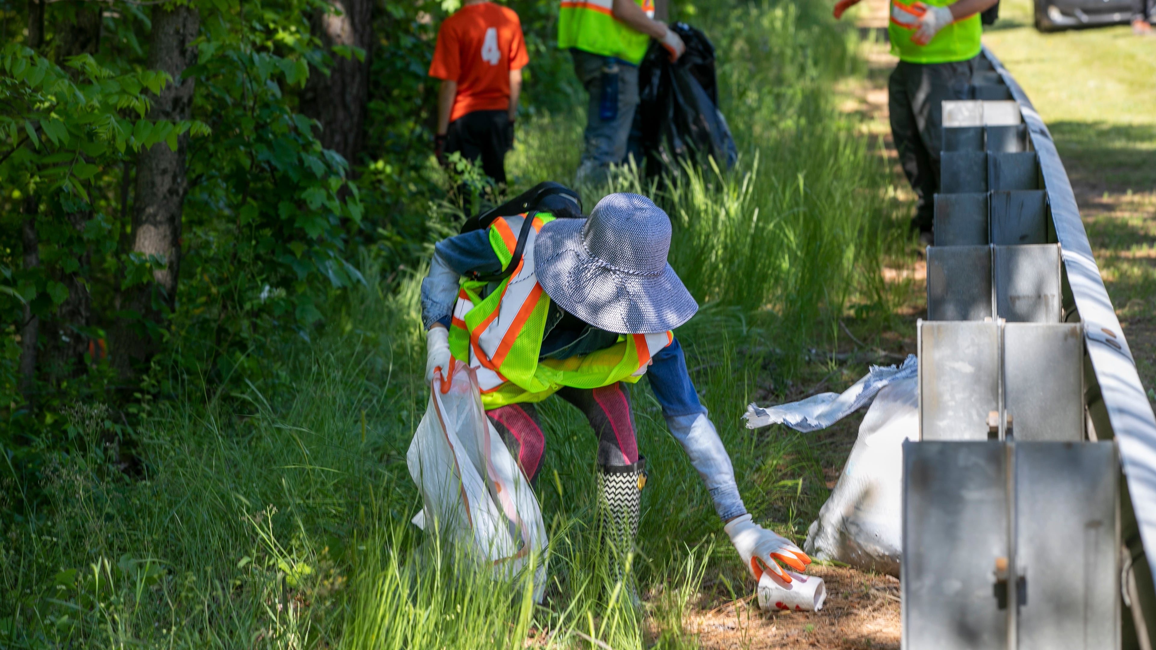 Gwinnett Clean & Beautiful volunteers engage in a roadside cleanup to address litter. (Courtesy Gwinnett Clean & Beautiful)
