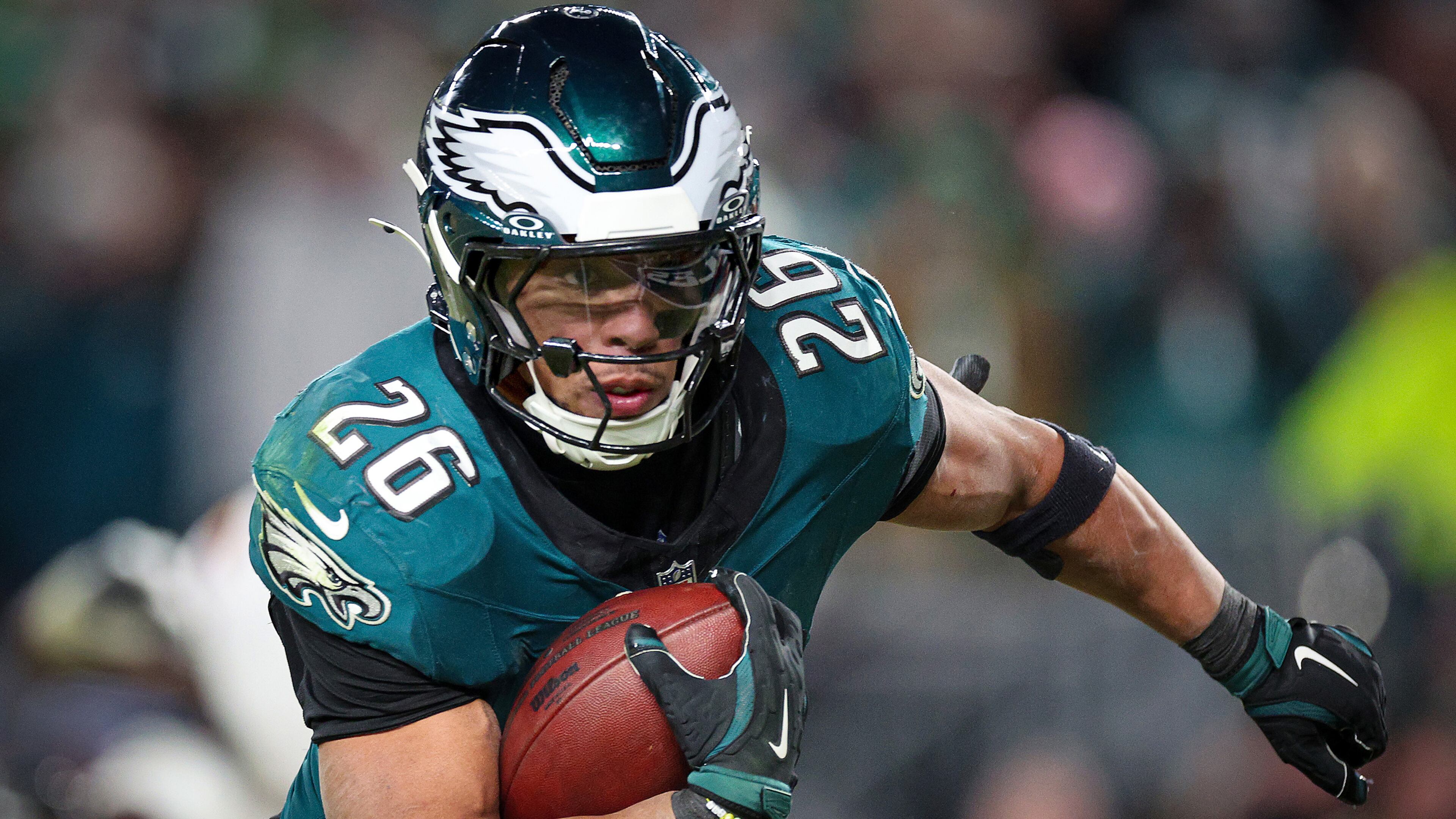Eagles running back Saquon Barkley looks towards the end zone on his way to a touchdown against the Washington Commanders during the NFC championship game. (David Maialetti/The Philadelphia Inquirer/TNS)