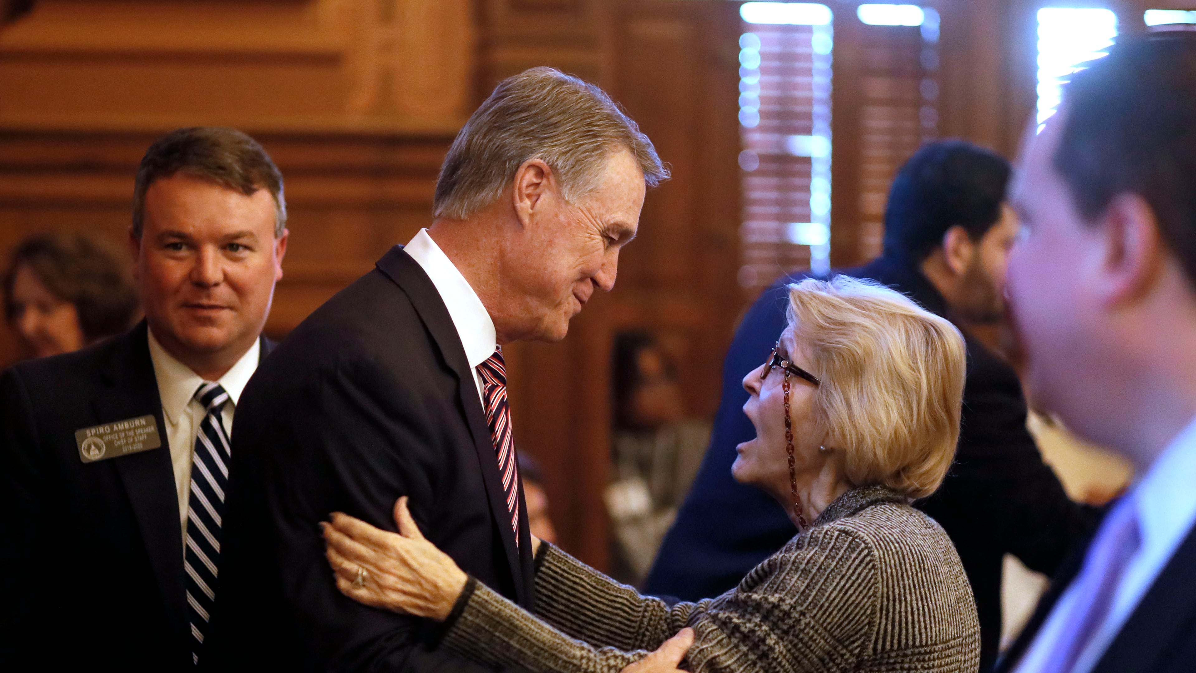 Rep. Susan Holmes (right), R-Monticello, greets U.S. Senator David Perdue in 2019 after he addressed the Georgia General Assembly. (Bob Andres/AJC)