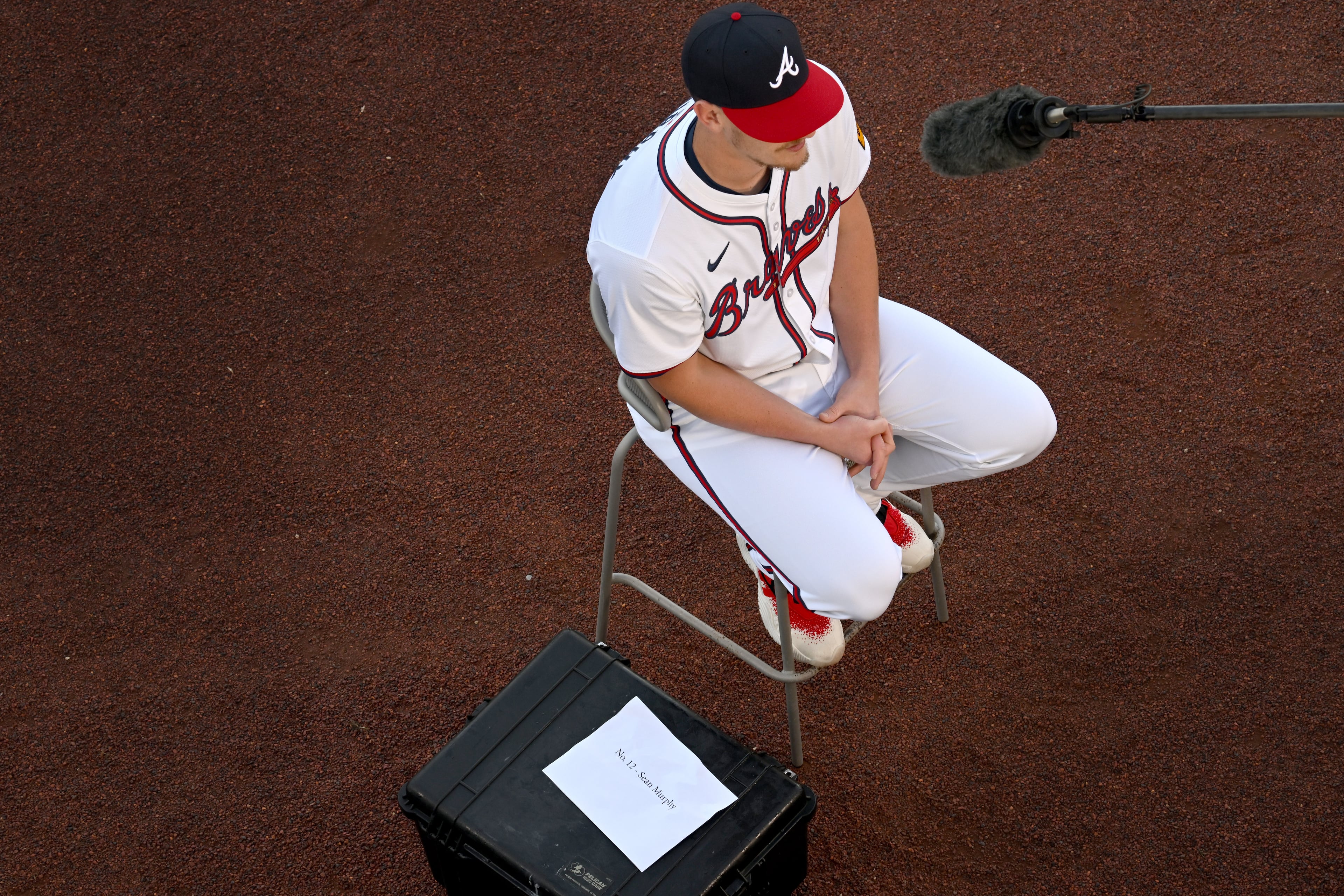 Atlanta Braves catcher Sean Murphy is interviewed in front of video camera during the team's photo day at CoolToday Park, Friday, Feb. 23, 2024, in North Port, Florida. (Hyosub Shin / Hyosub.Shin@ajc.com)