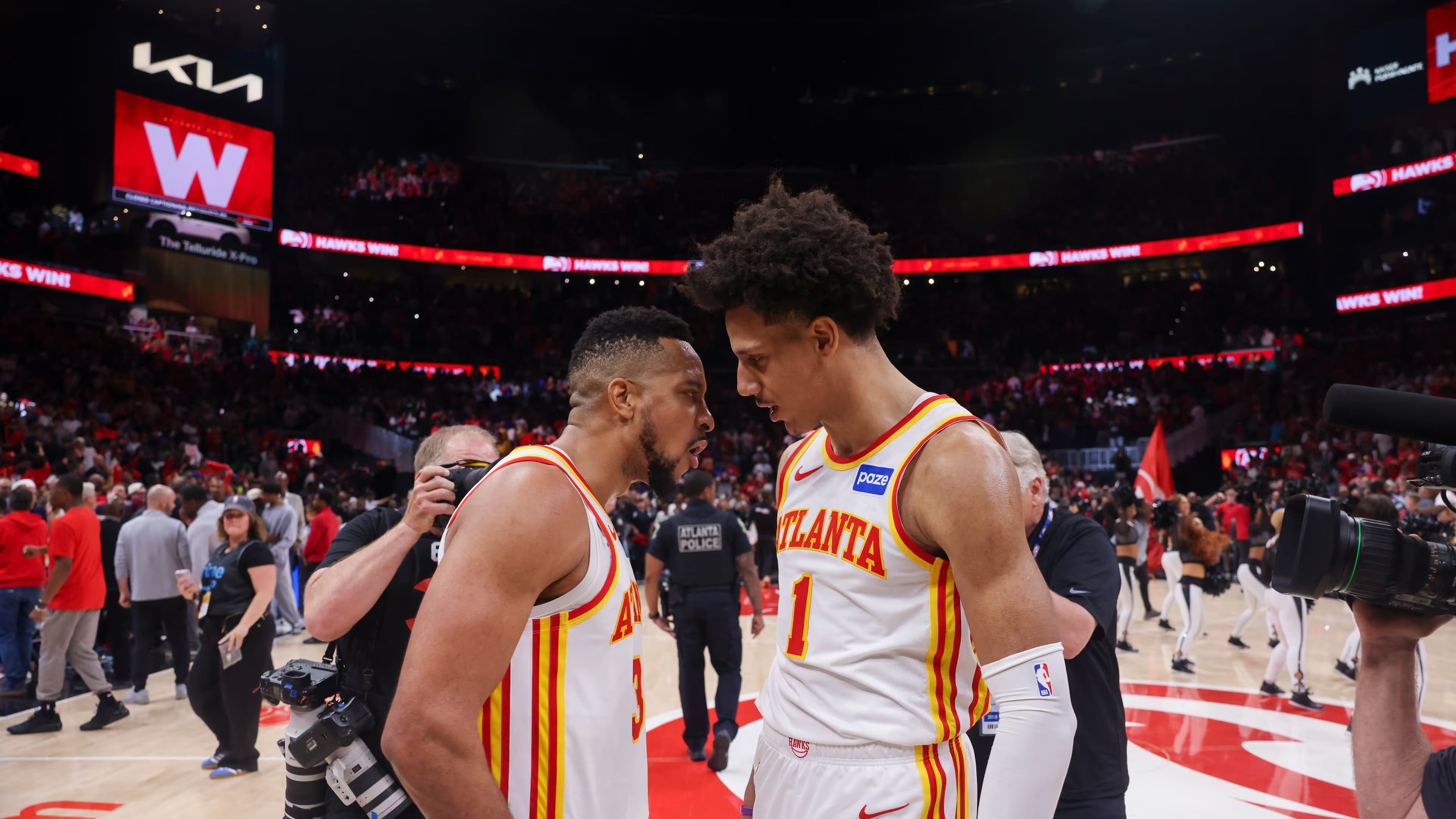 Atlanta Hawks guard CJ McCollum (3) and Atlanta Hawks forward Jalen Johnson (1) celebrate their 109-108 win against the New York Knicks in game 3 of the NBA first round playoffs at State Farm Arena, Thursday, April 23, 2026, in Atlanta. (Jason Getz/AJC)