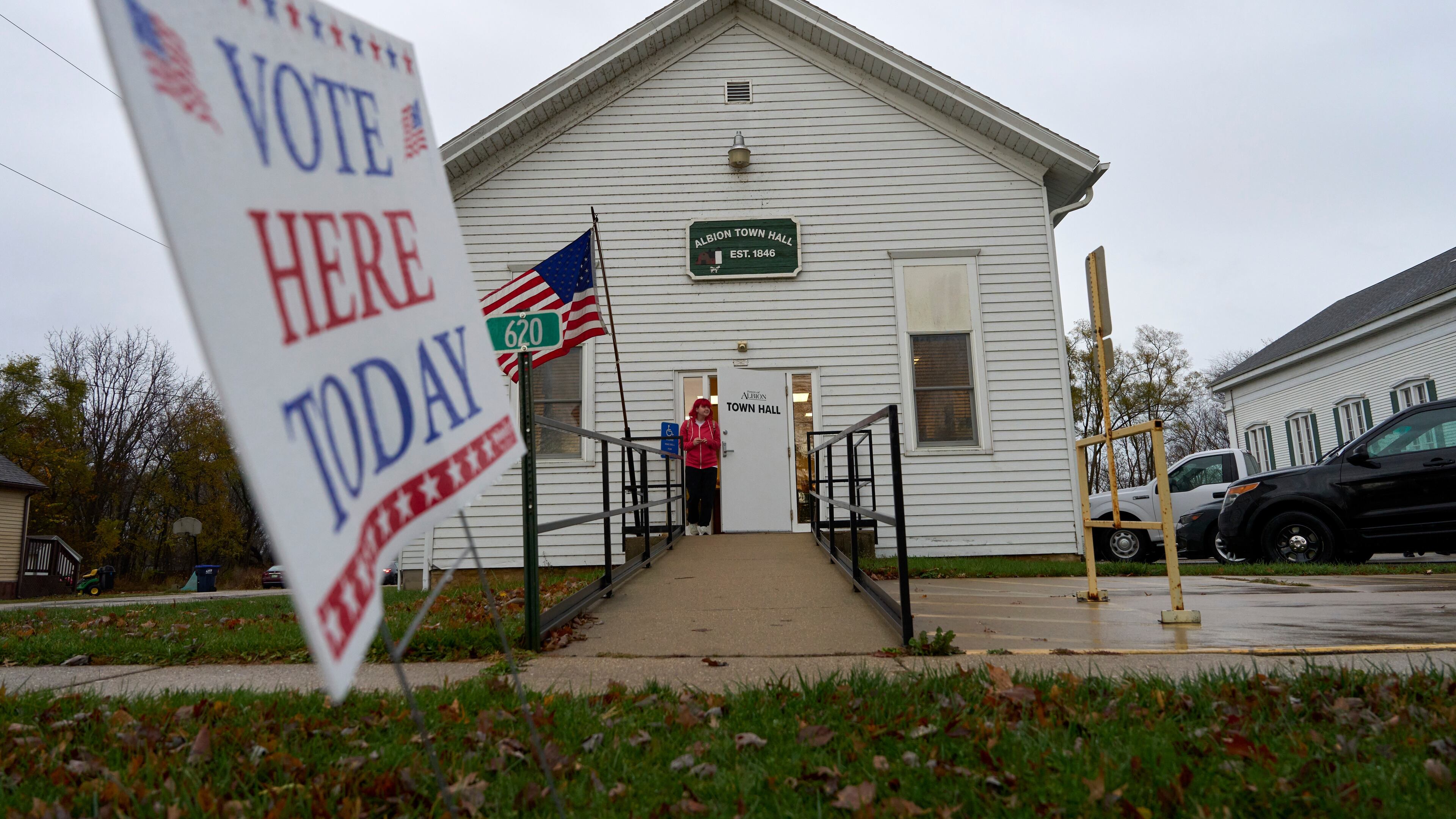 FILE - A voter leaves Albion Town hall after casting their ballot on Election Day, Nov. 5, 2024, in Albion, Wis. (AP Photo/Kayla Wolf, File)