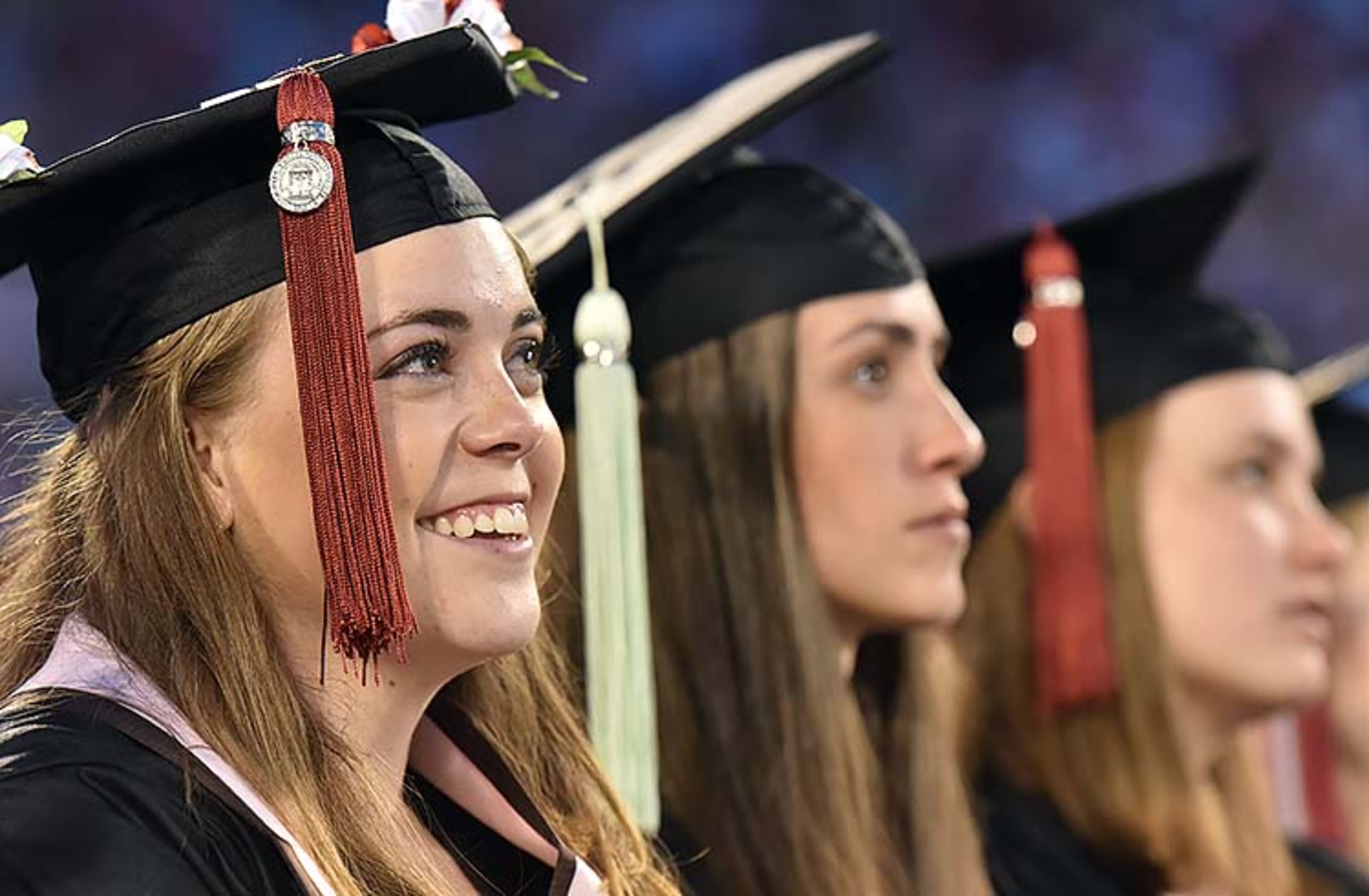 May 10, 2019 Athens - Students listen to commencement speaker Deborah Ann Roberts, news correspondent, during UGA's 2019 spring undergraduate commencement ceremony at Sanford Stadium in Athens on Friday, May 10, 2019. HYOSUB SHIN / HSHIN@AJC.COM