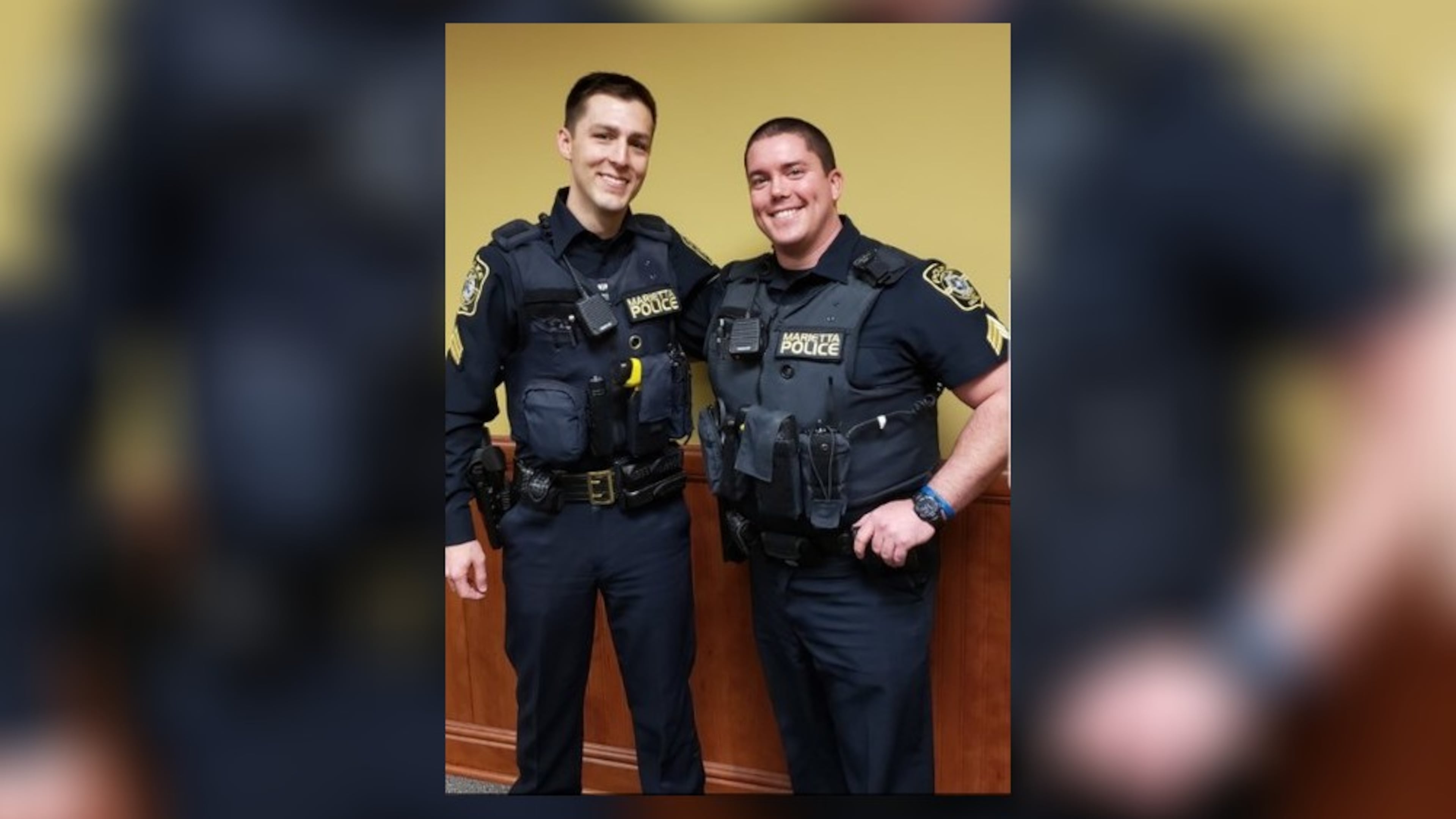 Jared Rakestraw, lleft, and Jayson Duncan were promoted to the rank of sergeant.