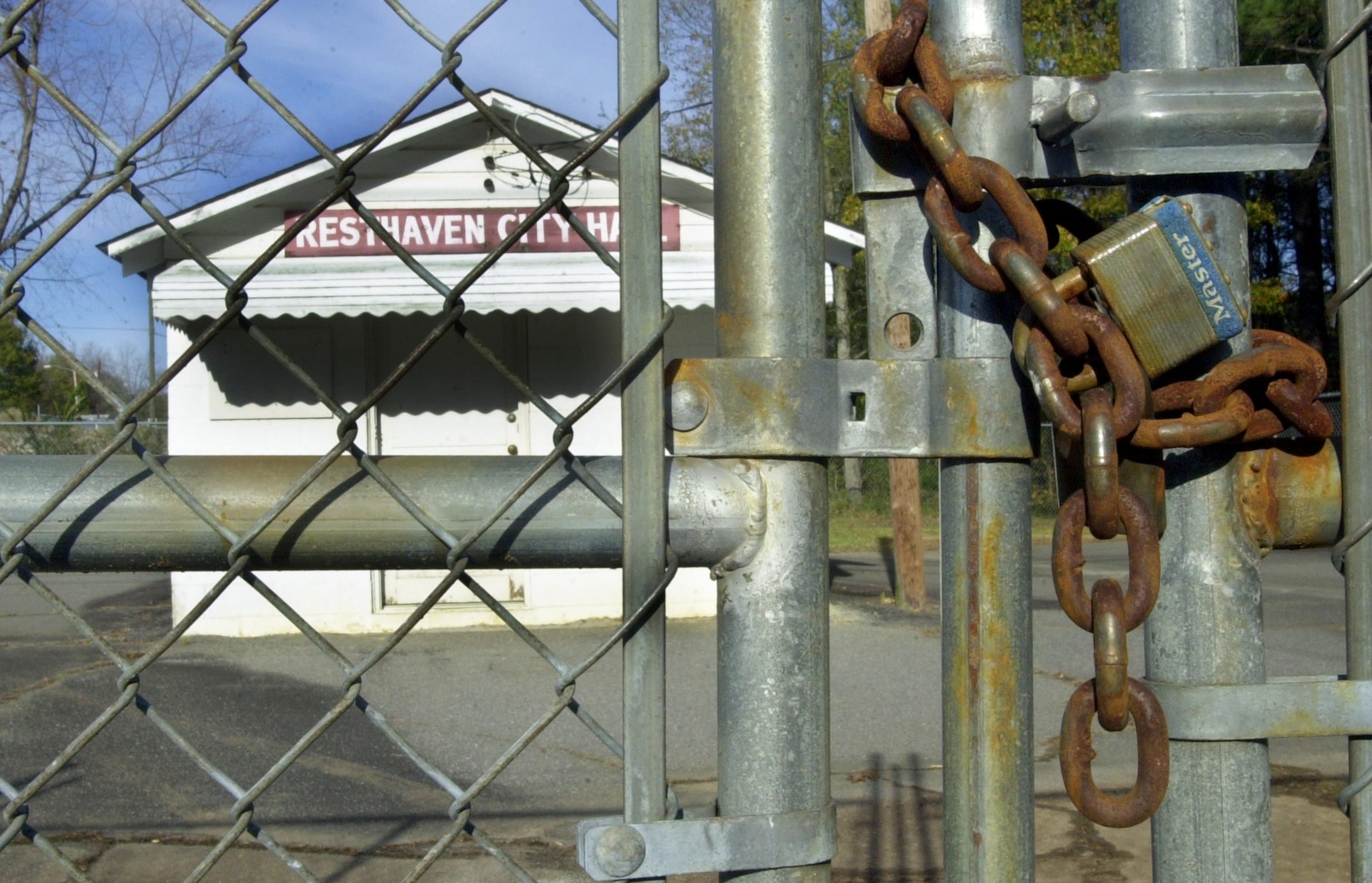 The town tried to dissolve itself in 2001, and for a short time succeeded after two residents sued, claiming that the city didn't provide enough services. However, a counter lawsuit by a resident forced the city to be reinstated in 2002, when this photo of the city hall was taken. “I guess we did it the wrong way,” said Kenneth Waycaster in 2016. He's been Rest Haven's mayor since 1988, and is proponent of the city's dissolution. (LAURA NOEL / AJC file)