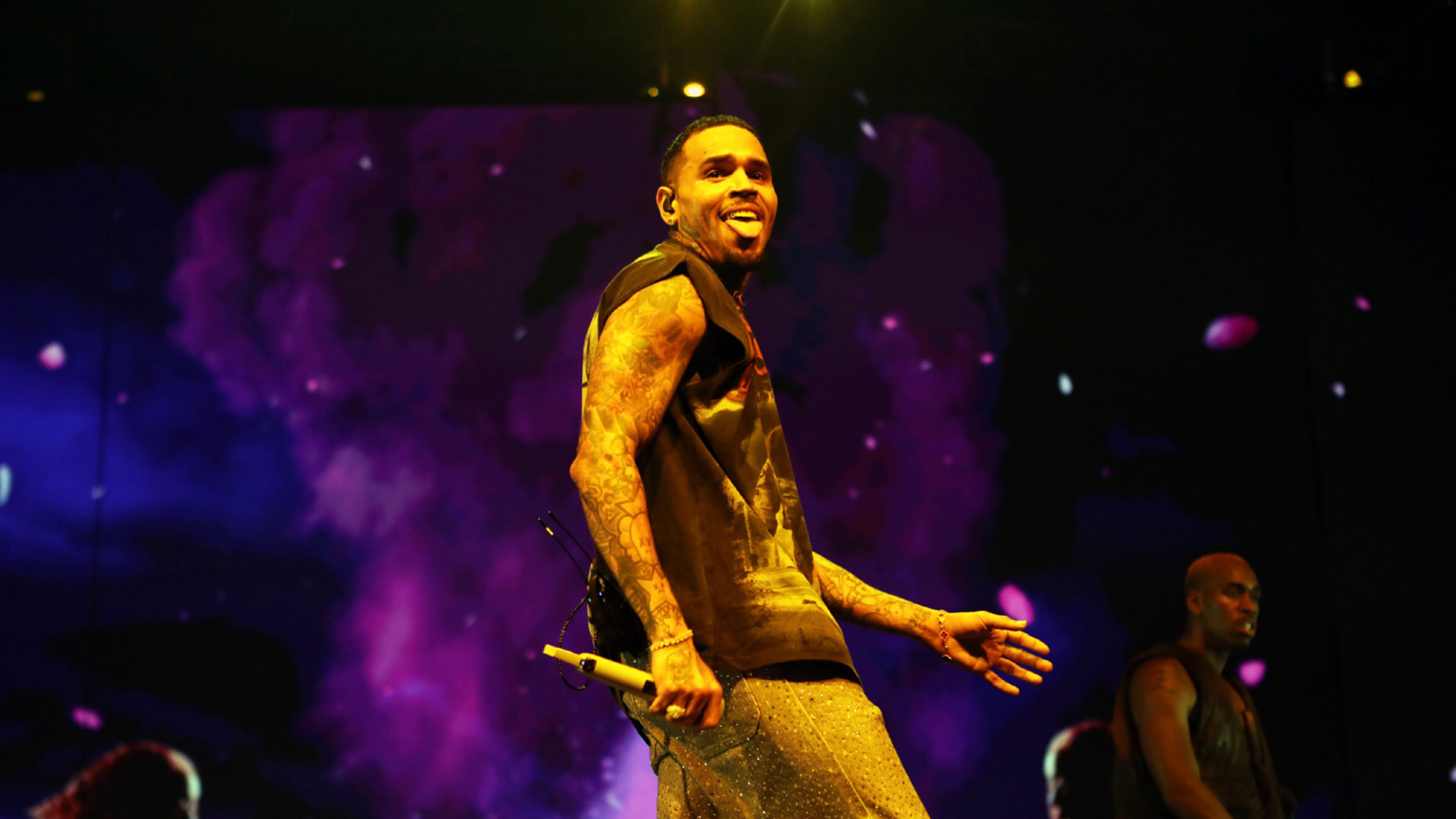 Chris Brown, pictured performing at State Farm Arena in July 2024, was back in Atlanta for shows Saturday and Sunday at Truist Park. Brown's Breezy Bowl Tour returns to Atlanta on Oct. 3 for a show in Georgia Tech's Bobby Dodd Stadium. (Robb Cohen for the AJC 2024)