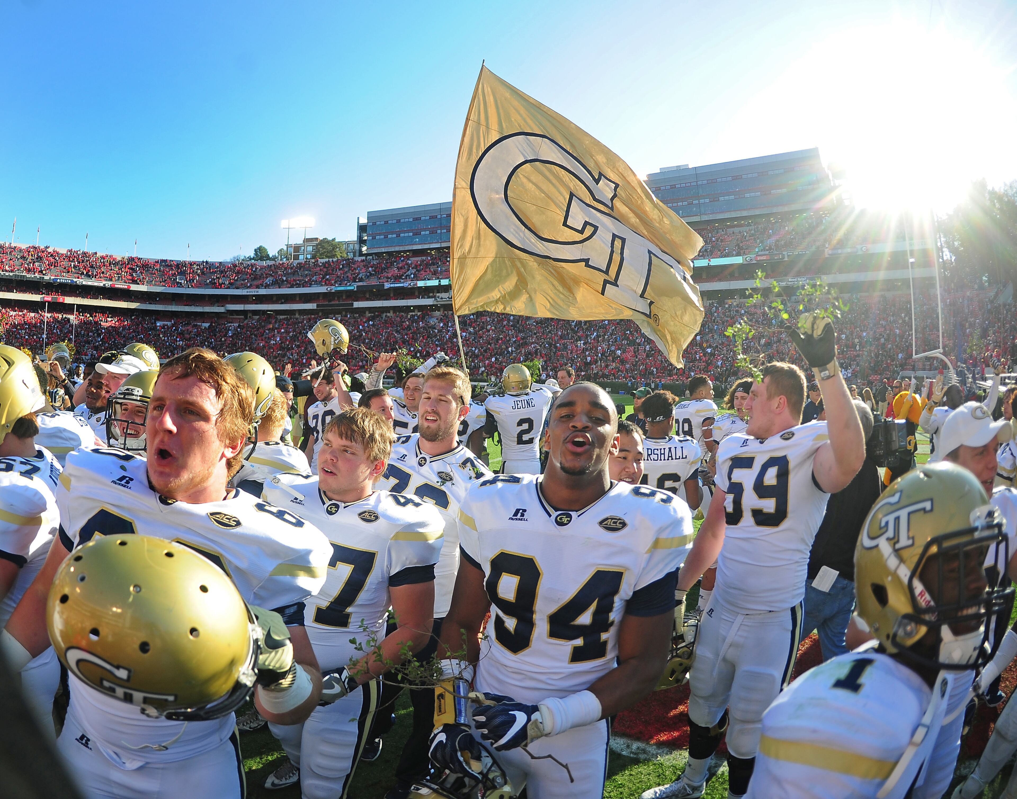 ATHENS, GA - NOVEMBER 26: Members of the Georgia Tech Yellow Jackets celebrate after the game against the Georgia Bulldogs at Sanford Stadium on November 26, 2016 in Athens, Georgia. (Photo by Scott Cunningham/Getty Images)