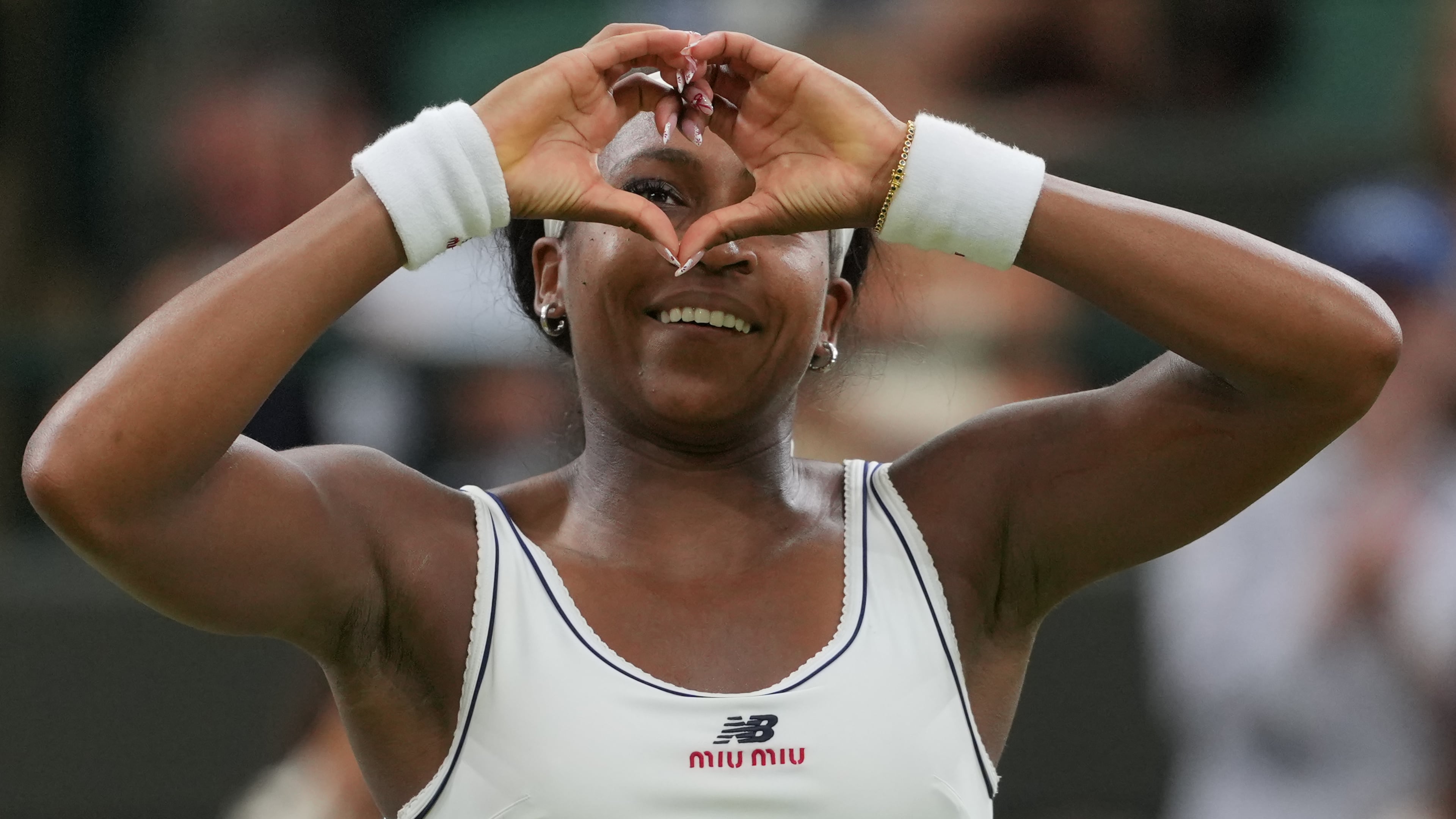 Coco Gauff of the United States reacts after winning against Belinda Bencic of Switzerland in their fourth round women's singles match at the Wimbledon Tennis Championships in London, Sunday, July 5, 2026. (AP Photo/Kin Cheung)