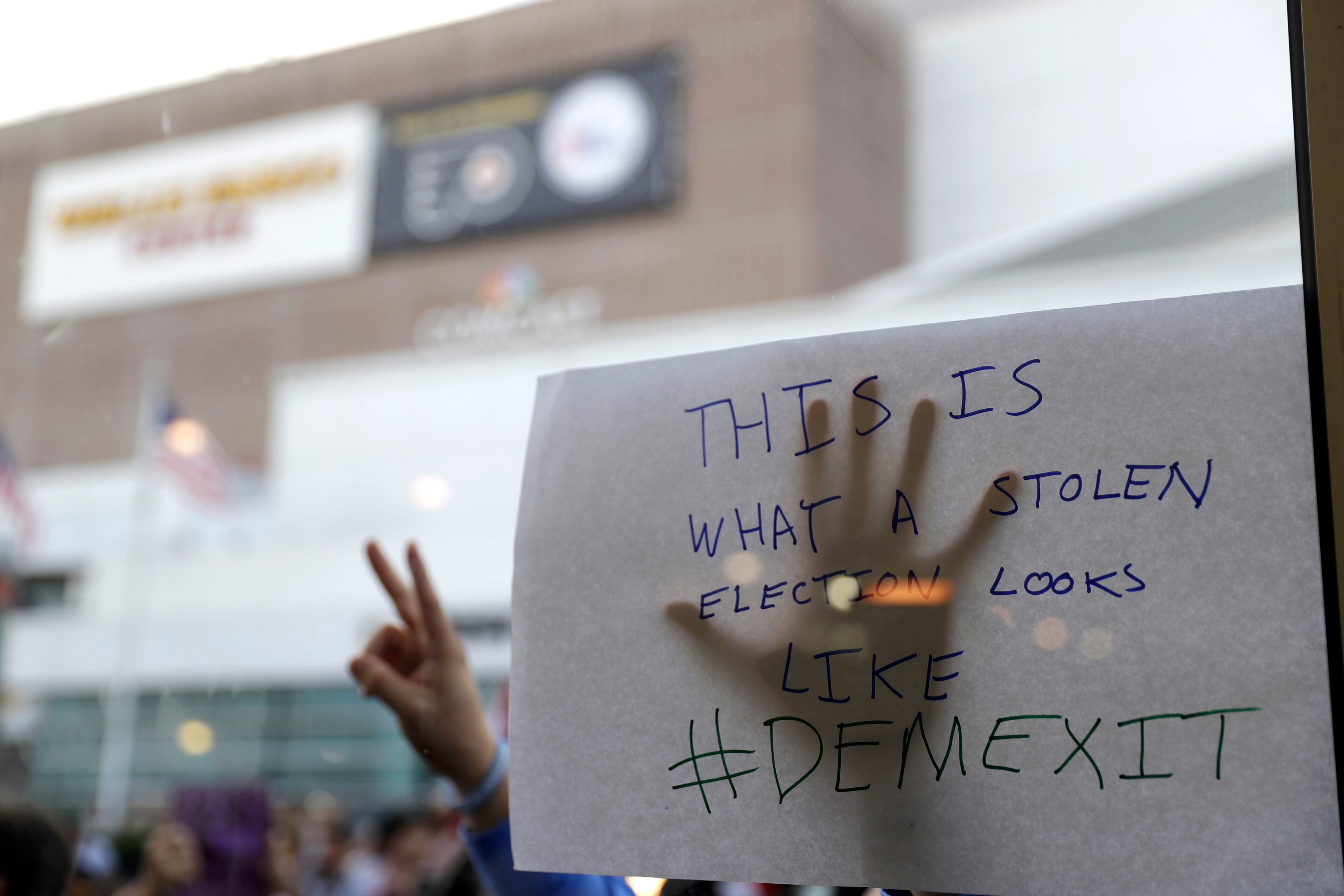 Delegates protest during the second day session of the Democratic National Convention in Philadelphia, Tuesday, July 26, 2016. (AP Photo/Matt Rourke)