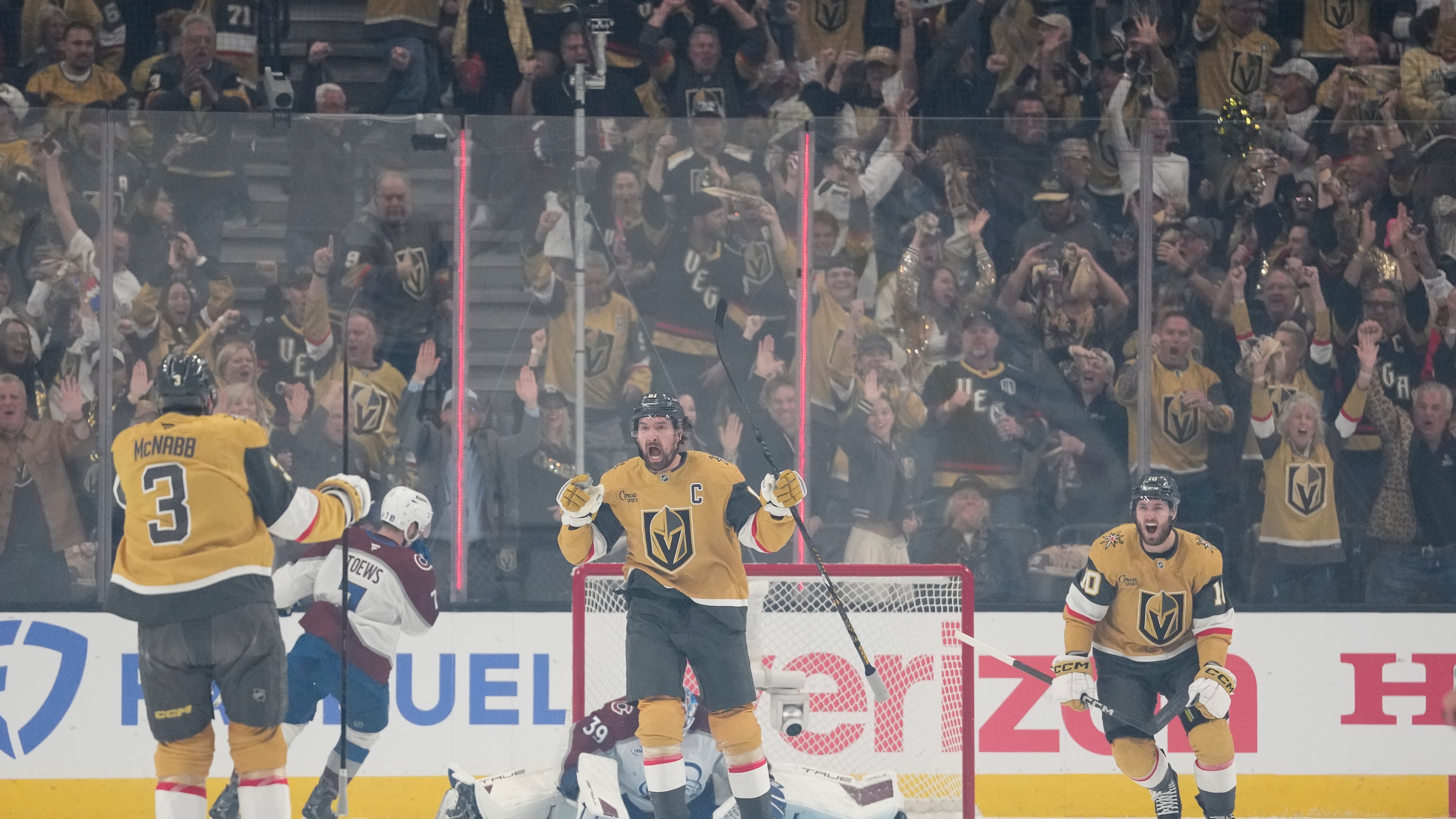 Vegas Golden Knights right wing Mark Stone, middle, celebrates after scoring a goal during the first period in Game 4 of the Western Conference finals NHL hockey Stanley Cup playoff series against the Colorado Avalanche Tuesday, May 26, 2026, in Las Vegas. (AP Photo/John Locher)