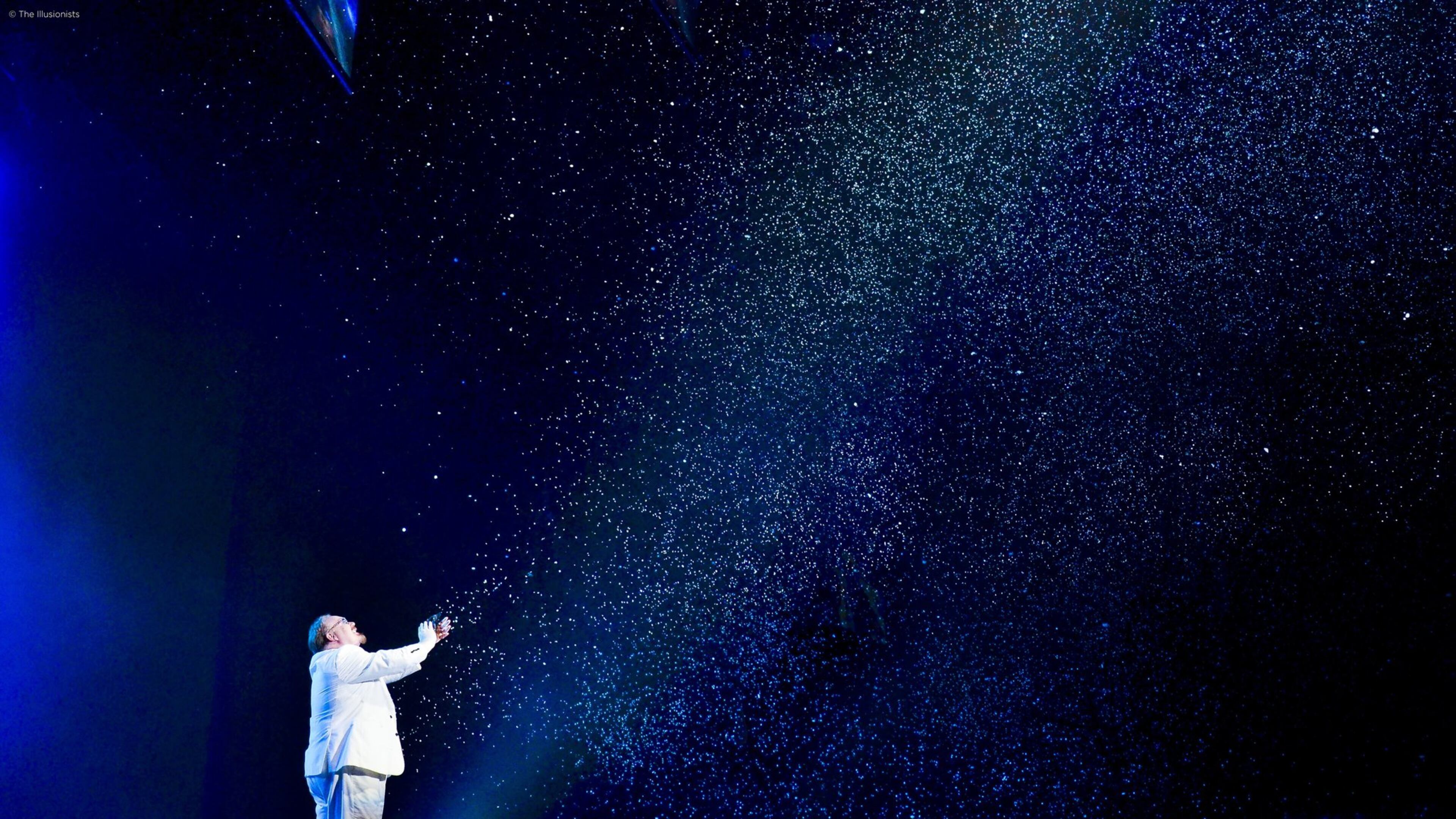 Kevin James (aka the Inventor) creates a shower of snowflakes from what appears to be a single piece of wet paper in “The Illusionists: Live From Broadway,” at the Fox Theatre through Sunday, Oct. 2. CONTRIBUTED BY “THE ILLUSIONISTS”