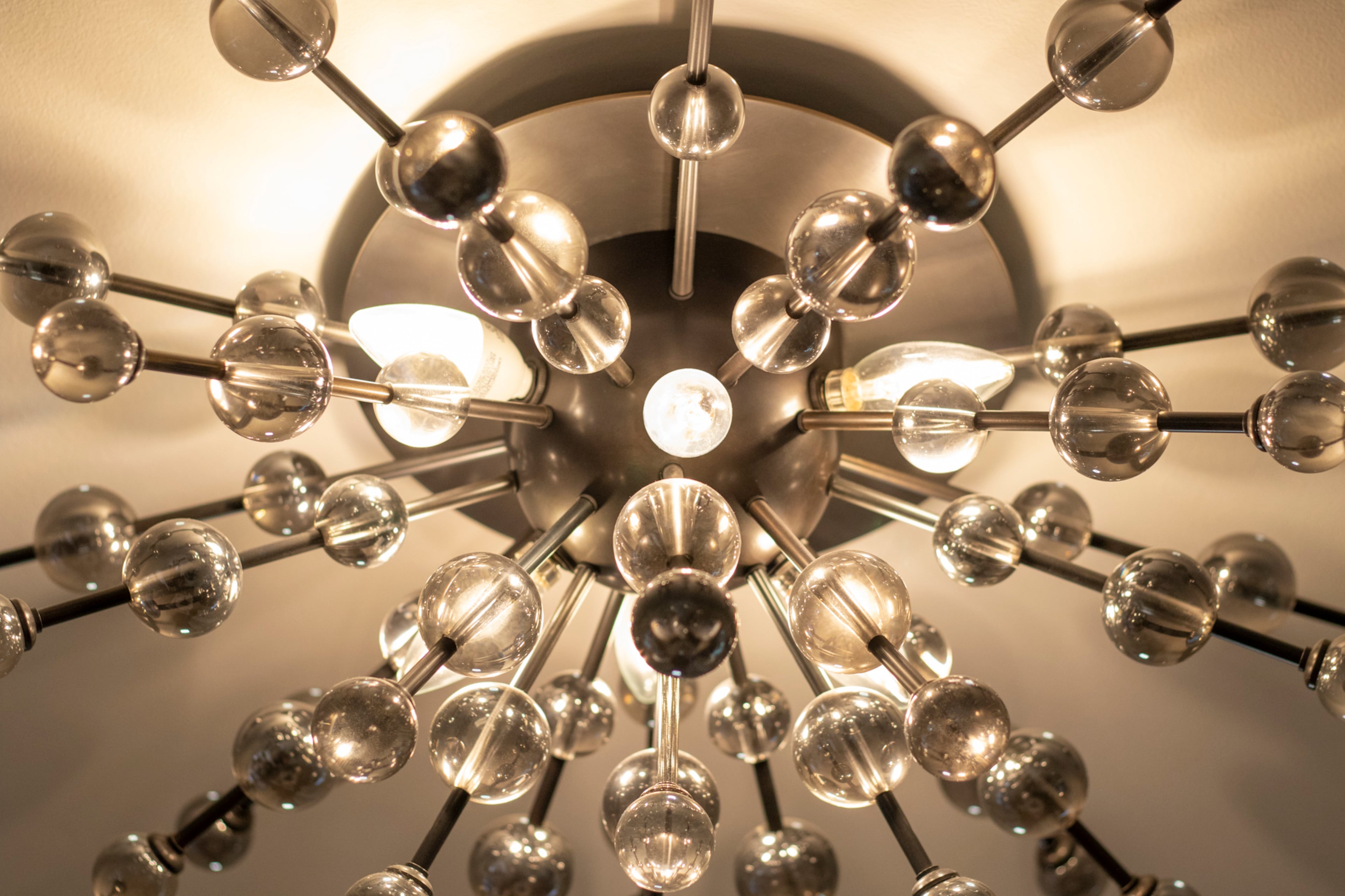 Guests often comment about the home's light fixtures, which were selected by designer Diane John and use different metal finishes, said homeowner Jan Kolker.