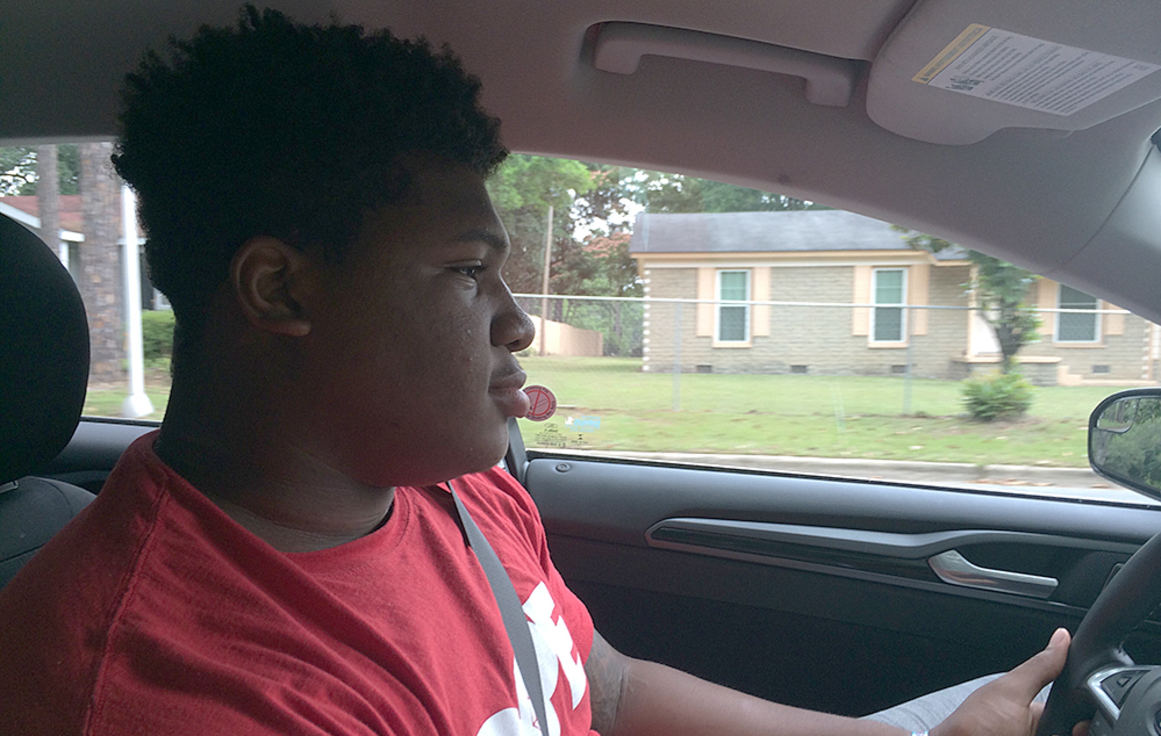 Trent Thompson drives around his neighborhood in Albany. He is listed as 6-foot-4, 311 pounds in the Georgia media guide. He says more accurately he's a little over 6-3 and weighed 308 pounds when he reported to UGA on June 1.