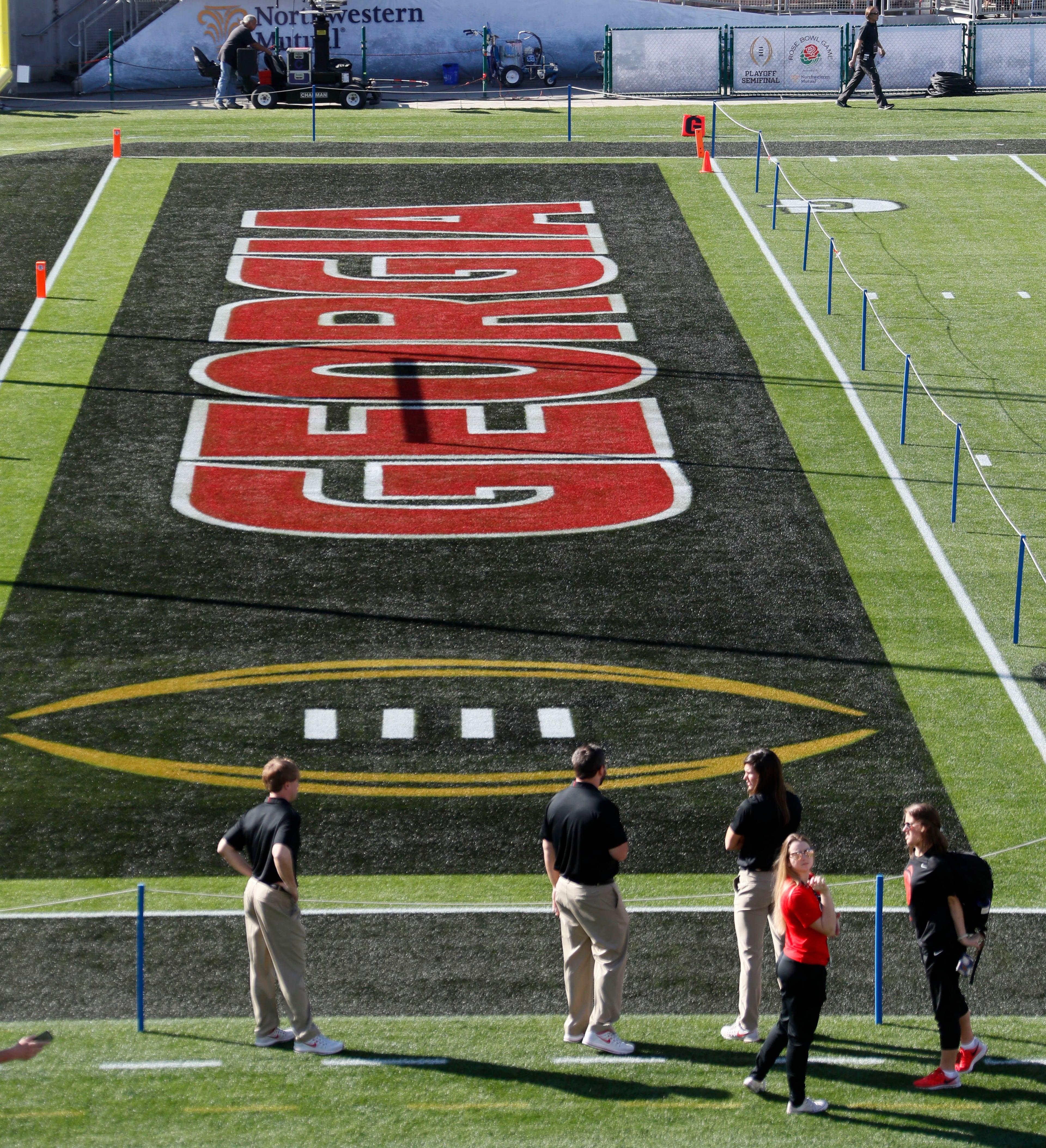 12/31/17 - Los Angeles - The Georgia end zone is painted and roped off the day before the event. Fans turned out at the Rose Bowl as both Georgia and Oklahoma arrived to take team photos. Georgia plays Oklahoma in a NCAA football playoff game on Monday at Spieker Field, and a victory there, will put the Bulldogs in Mercedes-Benz Stadium on Jan. 8 to play one of two rivals -- Alabama or Clemson -- for the national title. AJC Photo