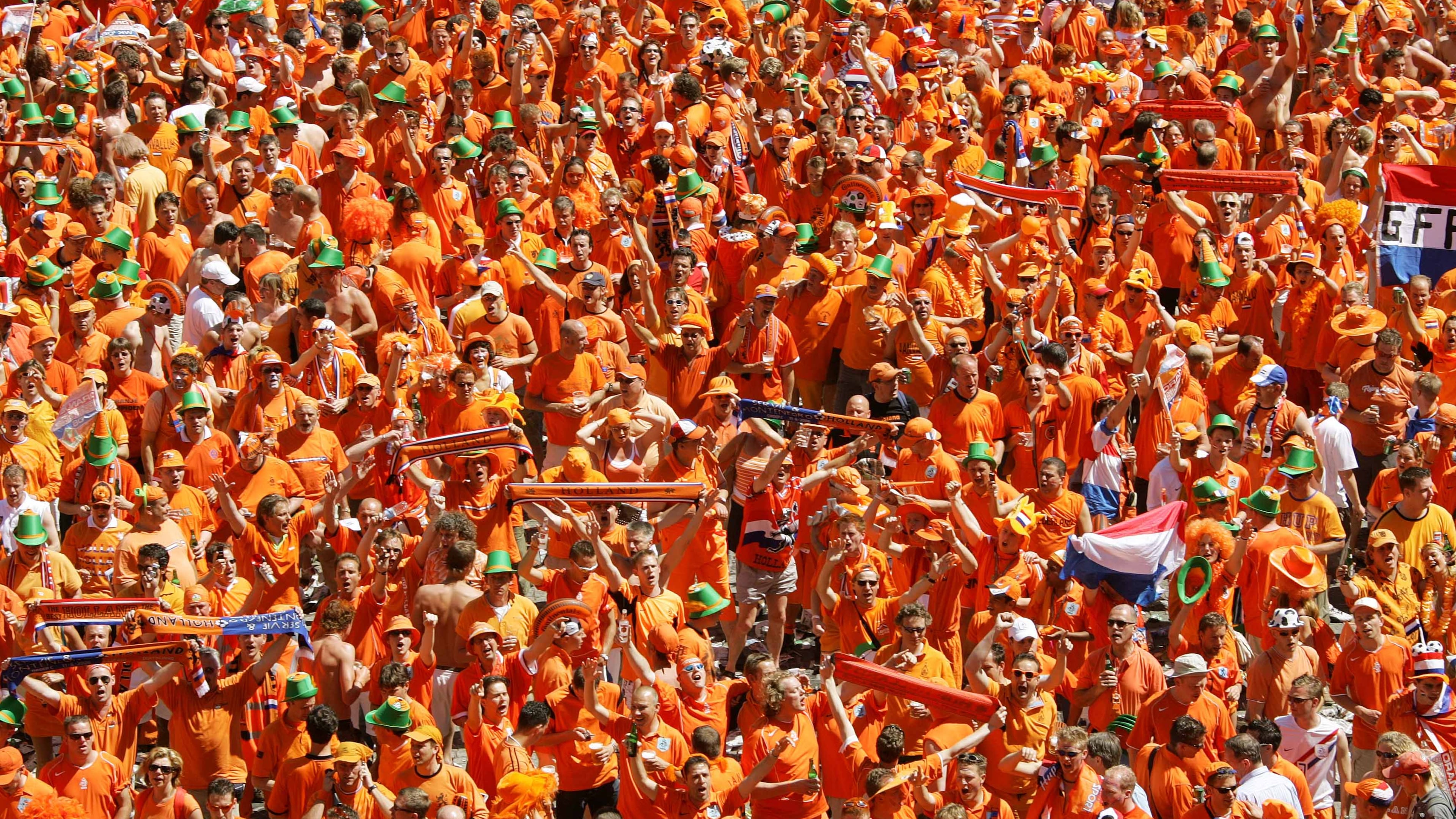 FILE - Dutch fans celebrate in preparation for the first match of their team at the special Dutch fan party area in Leipzig, eastern Germany, June 11, 2006. (AP Photo/Eckehard Schulz, File)