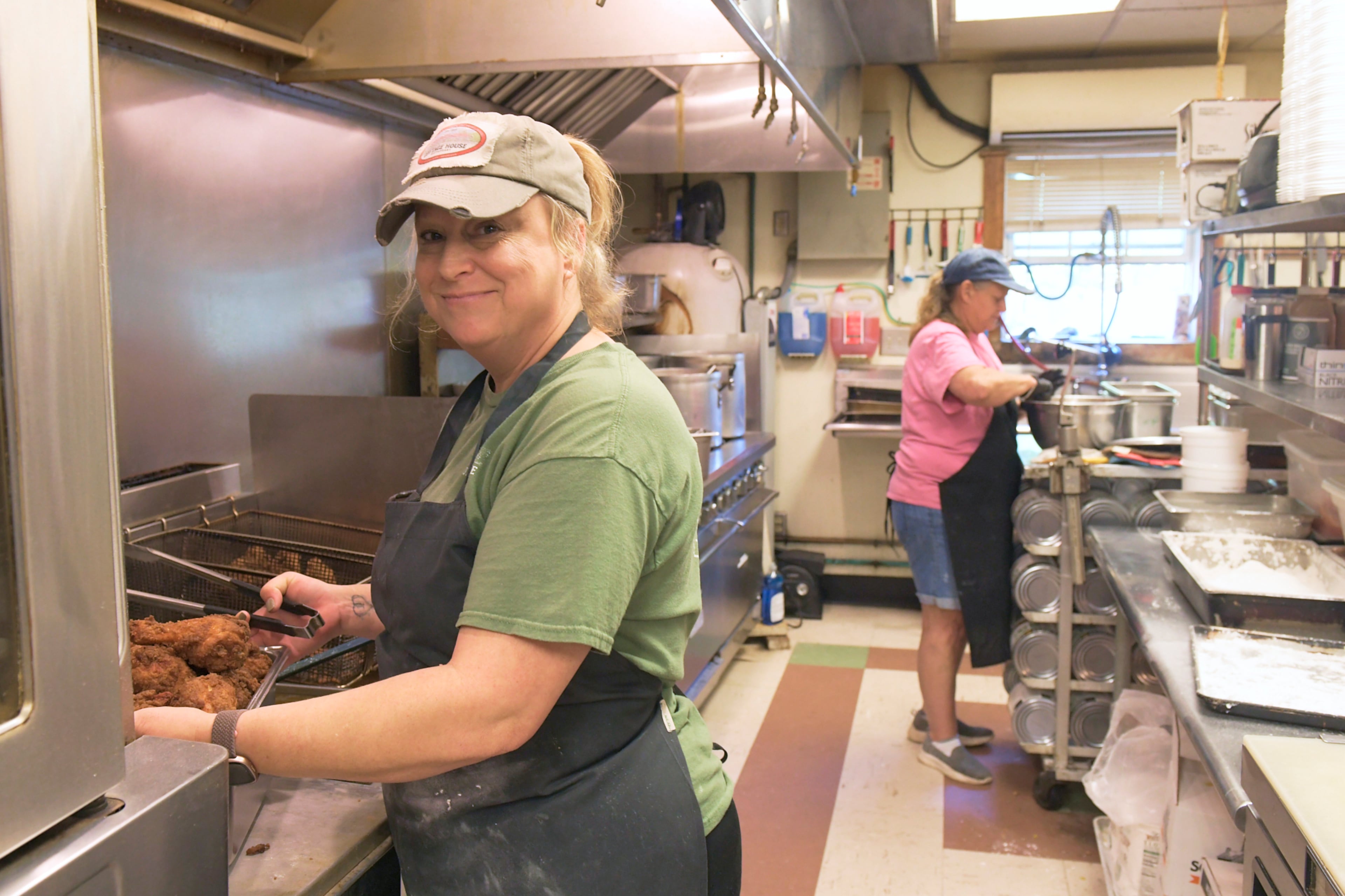 Tara Callahan frying chicken int eh kitchen of the Cottage House Restaurant.
Photo taken on Tuesday October 8th, 2024 by Greg Rannells for The Atlanta Journal Constitution.
Slug: AAJC 120824 dg diners intro.