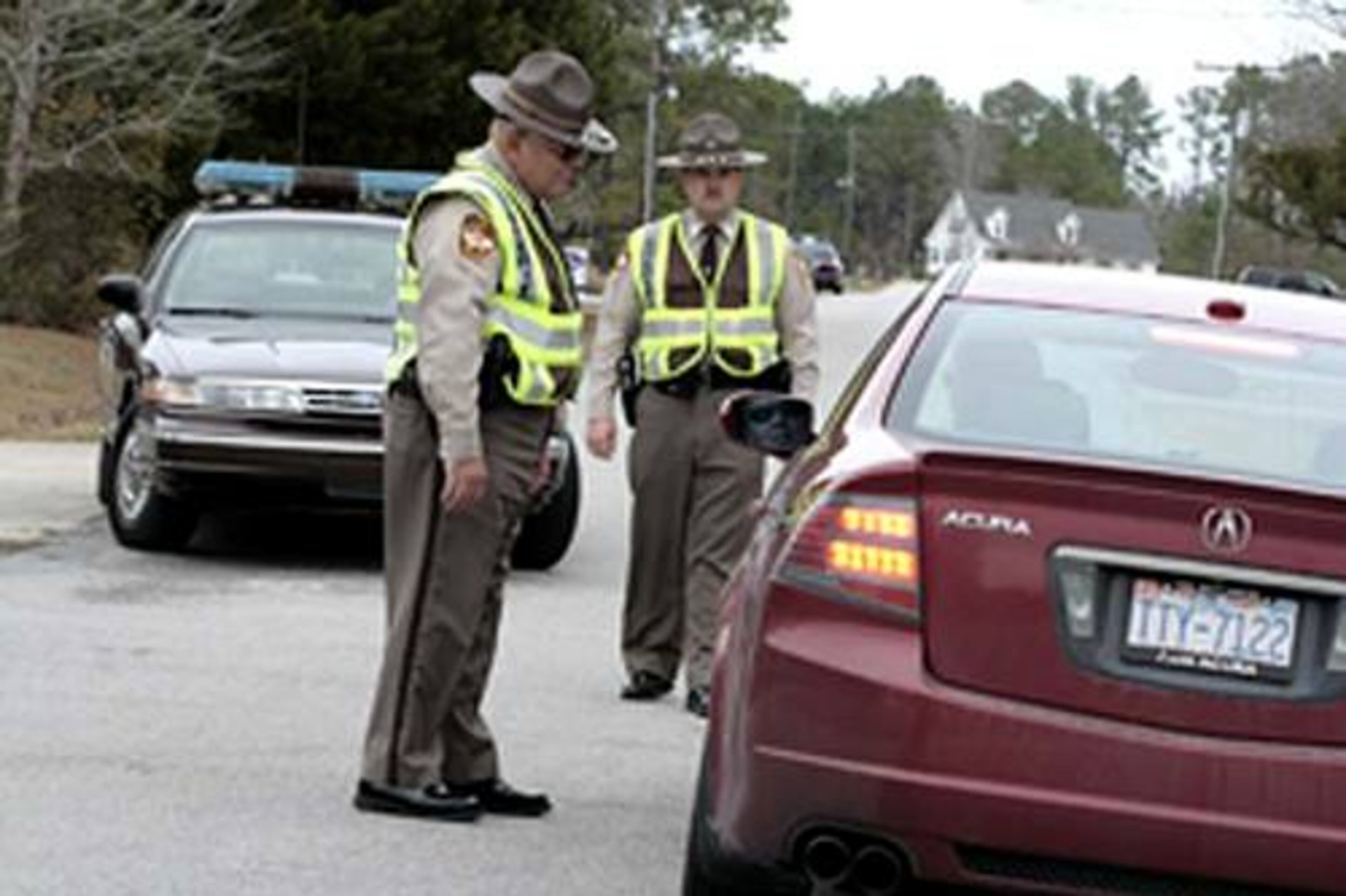 Onslow County sheriff deputies stop traffic near Jacksonville, N.C., early Friday as the search for Lance Cpl. Maria Lauterbach intensified.