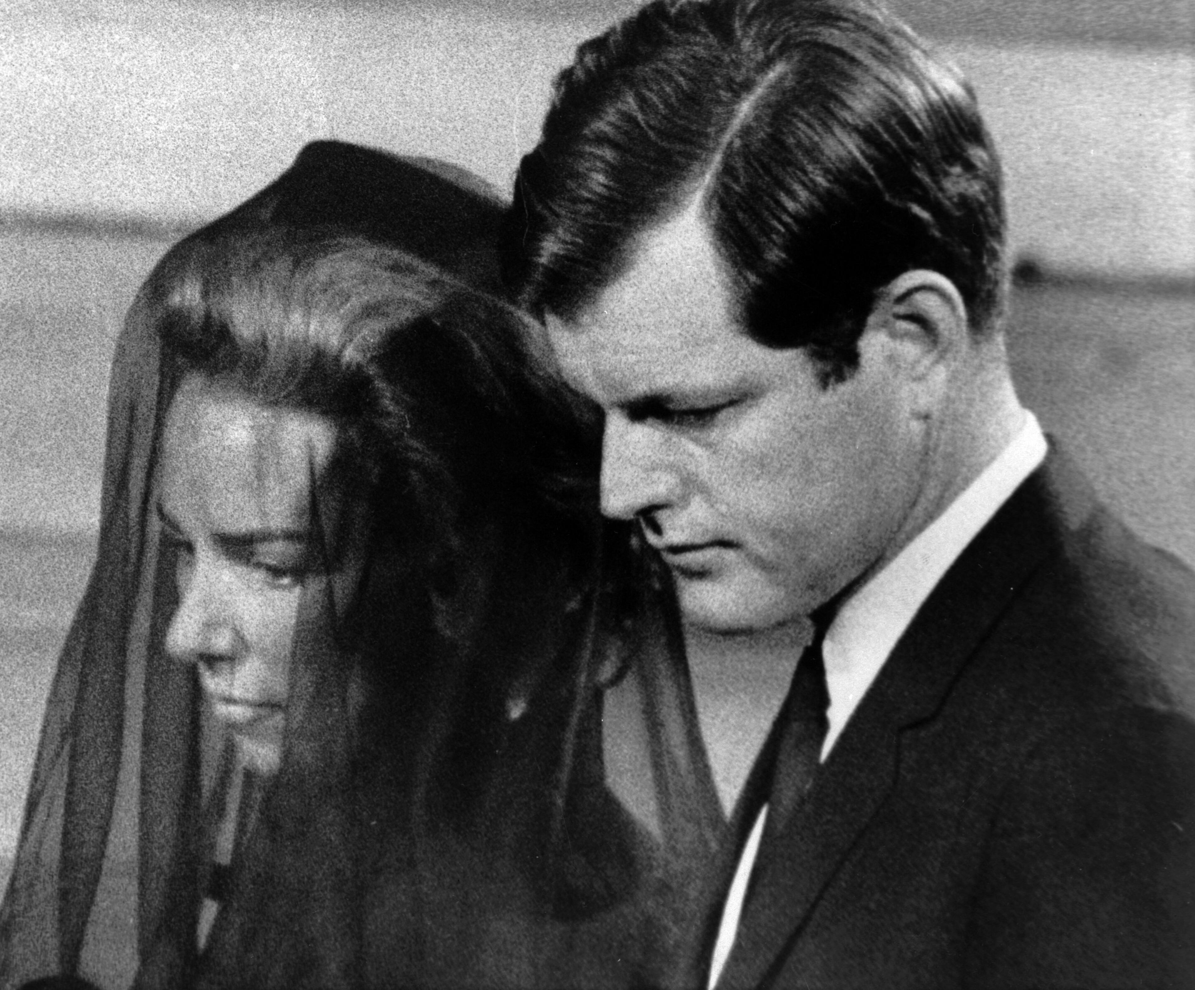 Mrs. Ethel Kennedy is escorted by her brother-in-law, Senator Edward Kennedy, to their pew in St. Patrick's Cathedral in New York for the funeral services of Senator Robert F. Kennedy, the morning of June 8, 1968. (AP Photo/stf)