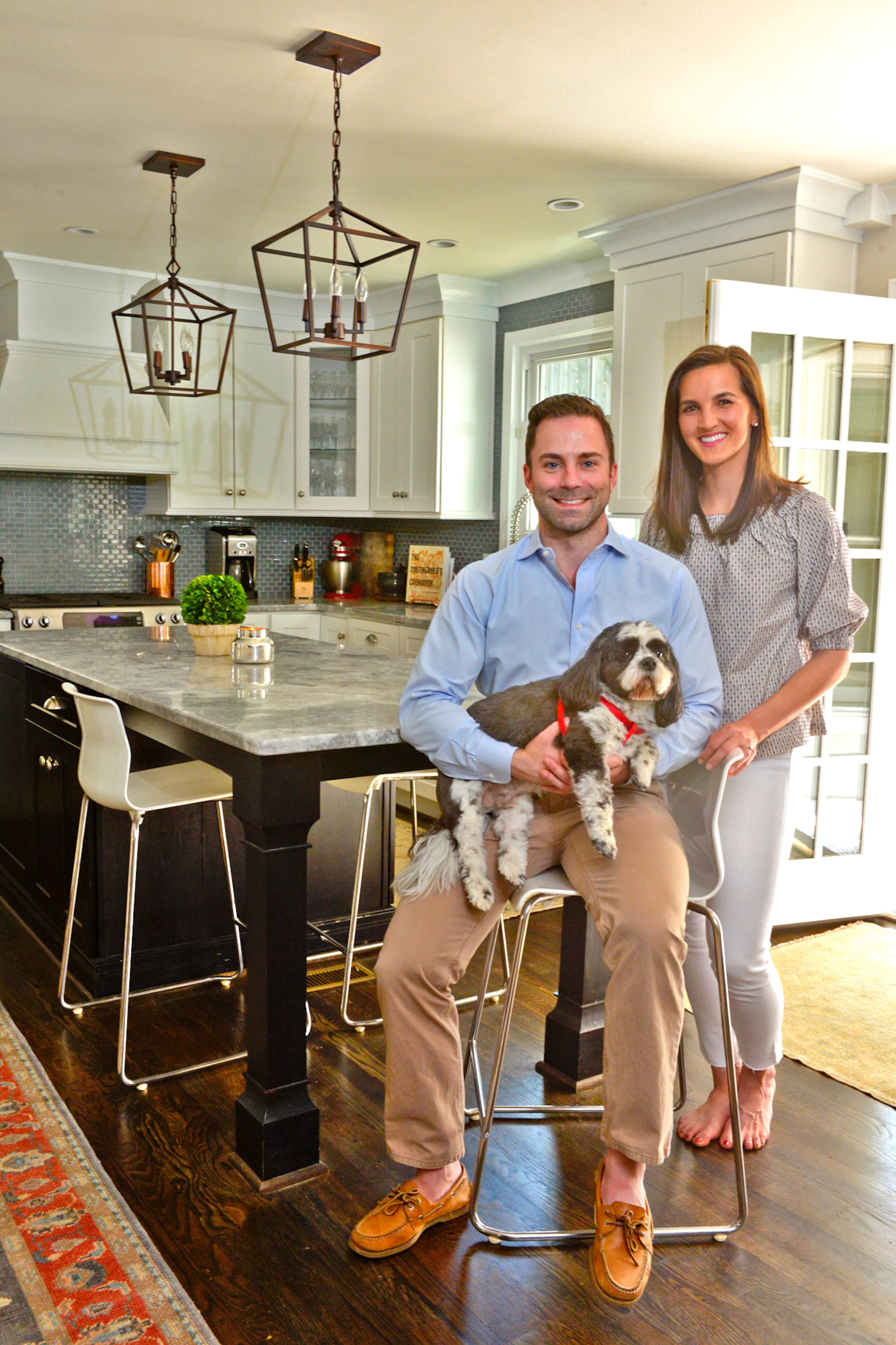 Katherine Trainor, an attorney at MendenFreiman LLP, and Bill Trainor, a pilot for Delta, bought their mid-century, three-bedroom, two-bath ranch home in Atlanta's Collier Hills neighborhood in 2013, where they live with their Shih-Tzu, Bob.