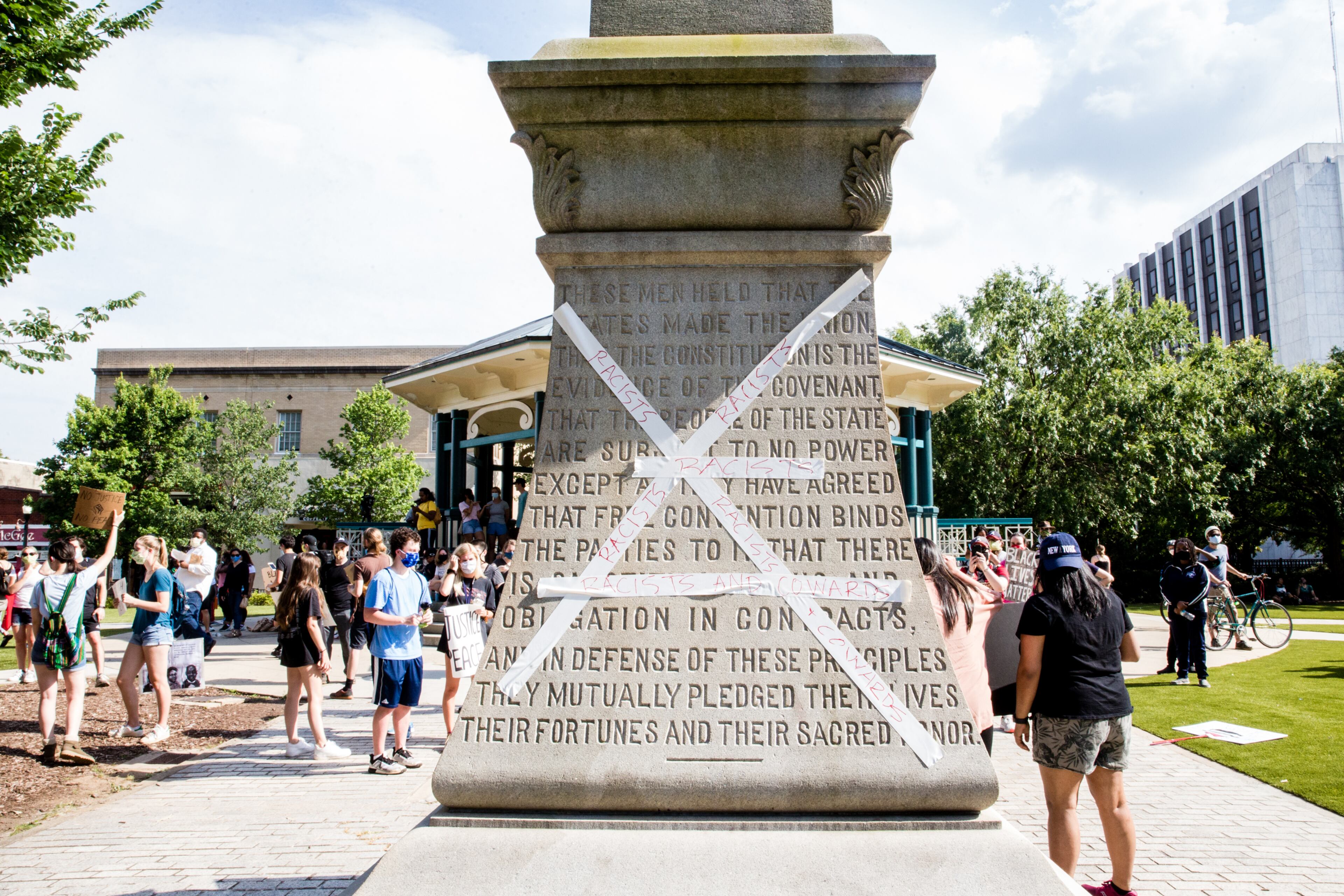 Protests continue Wednesday, June 3, 2020, in Decatur where large groups gathered, marched around Decatur Square and settled at on the plaza where they held silent for eight minutes, in remembrance of George Floyd and the number of minutes he was held down by police. (Jenni Girtman for The Atlanta journal Constitution)