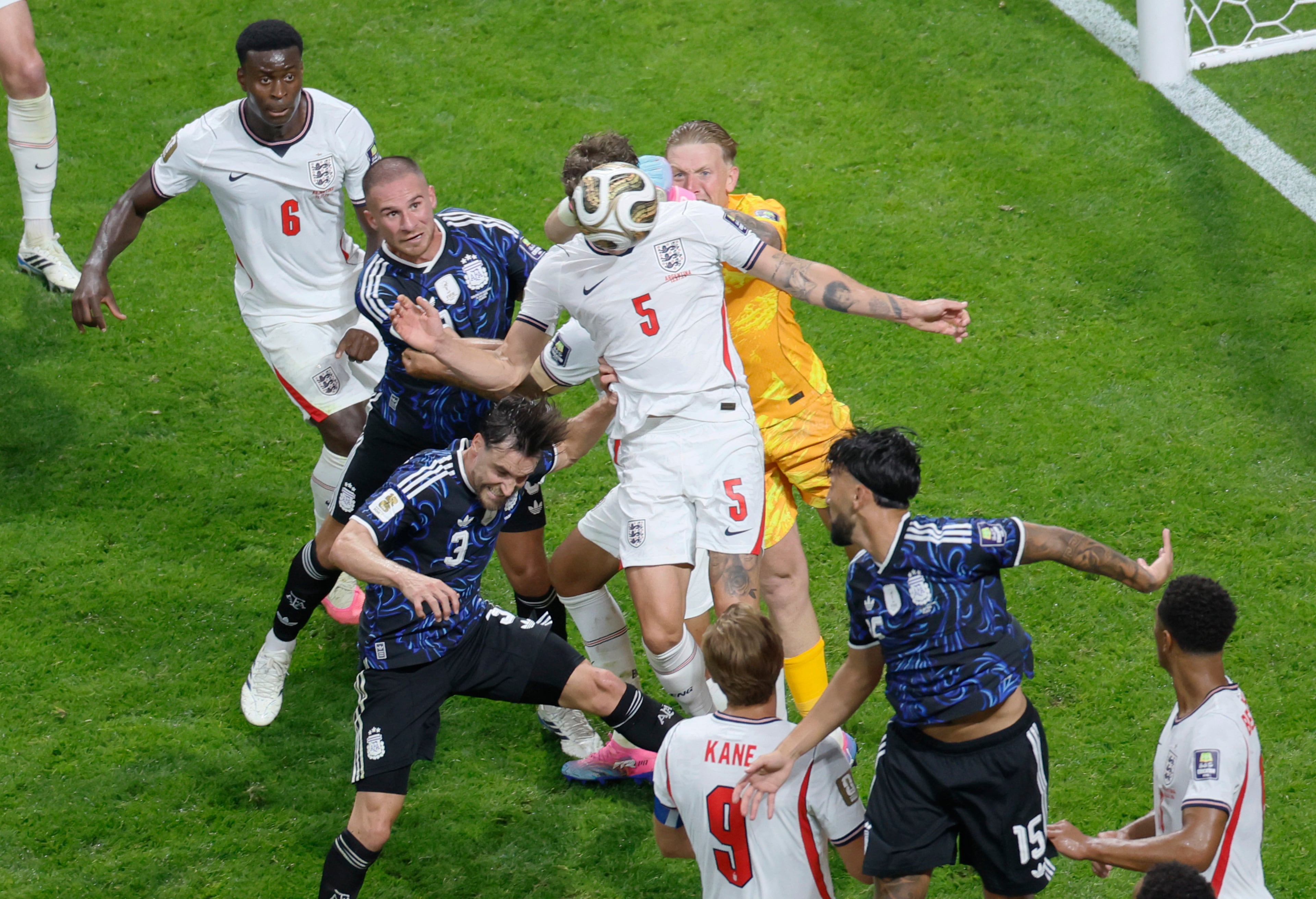 England defender John Stones, (5), heads the ball away from goal during second half of Argentina vs. England FIFA World Cup Semifinal match at Atlanta Stadium (Mercedes-Benz Stadium) on Wednesday, July 15, 2026. (Miguel Martinez/AJC)