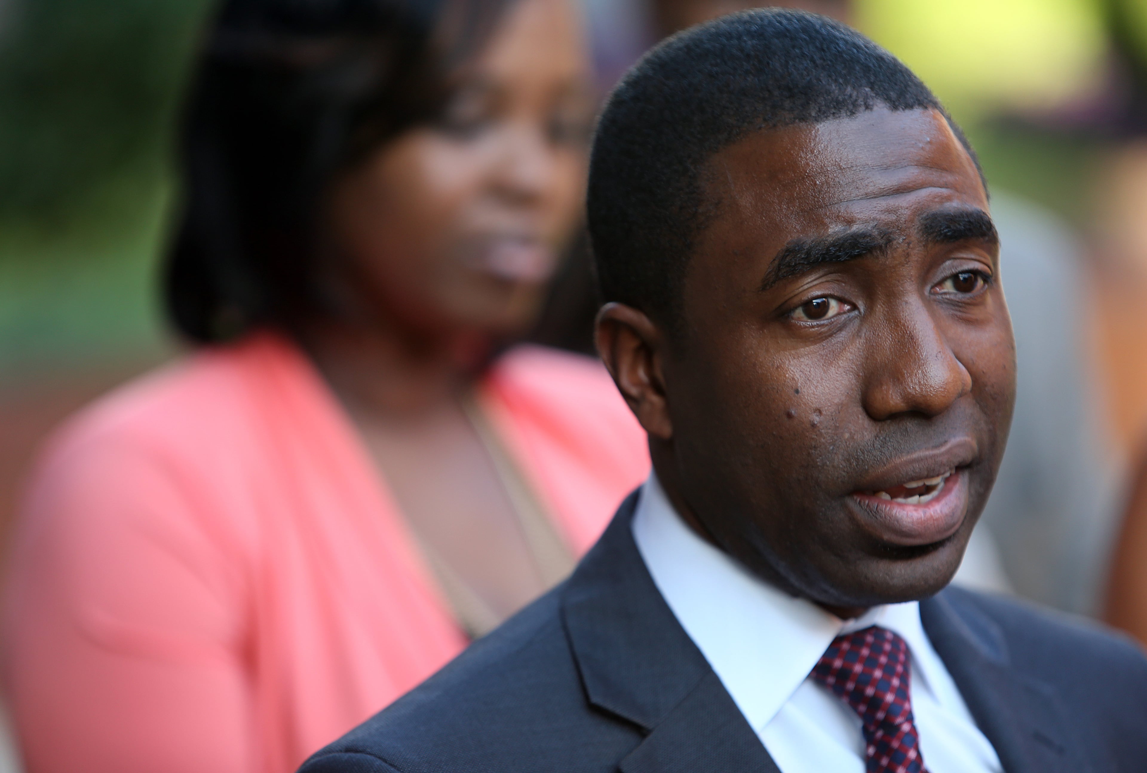 New DeKalb Interim CEO Lee May talks to members of the media after being sworn in July 16, 2013, in Decatur. Gov. Nathan Deal named May interim CEO after suspending Burrell Ellis, who is under a 15-count indictment.